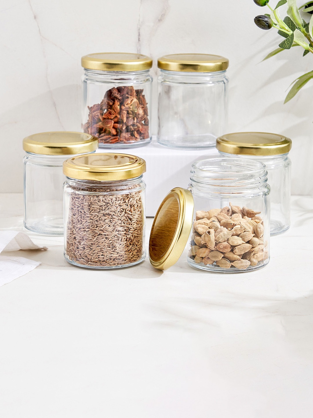 

Home Centre Corsica Maria Transparent 6 Pieces Glass Storage Jars With Lid - 200 ml