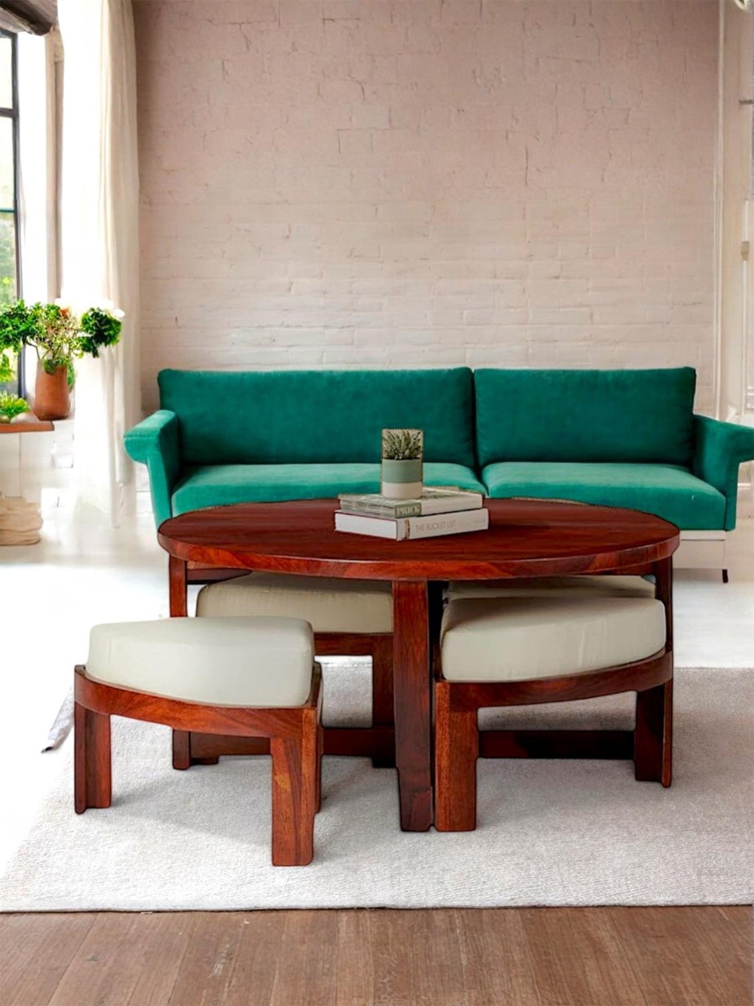 

Ikiriya Red Textured Wooden Honey Finish Round Coffee Table With Stool and Cushions