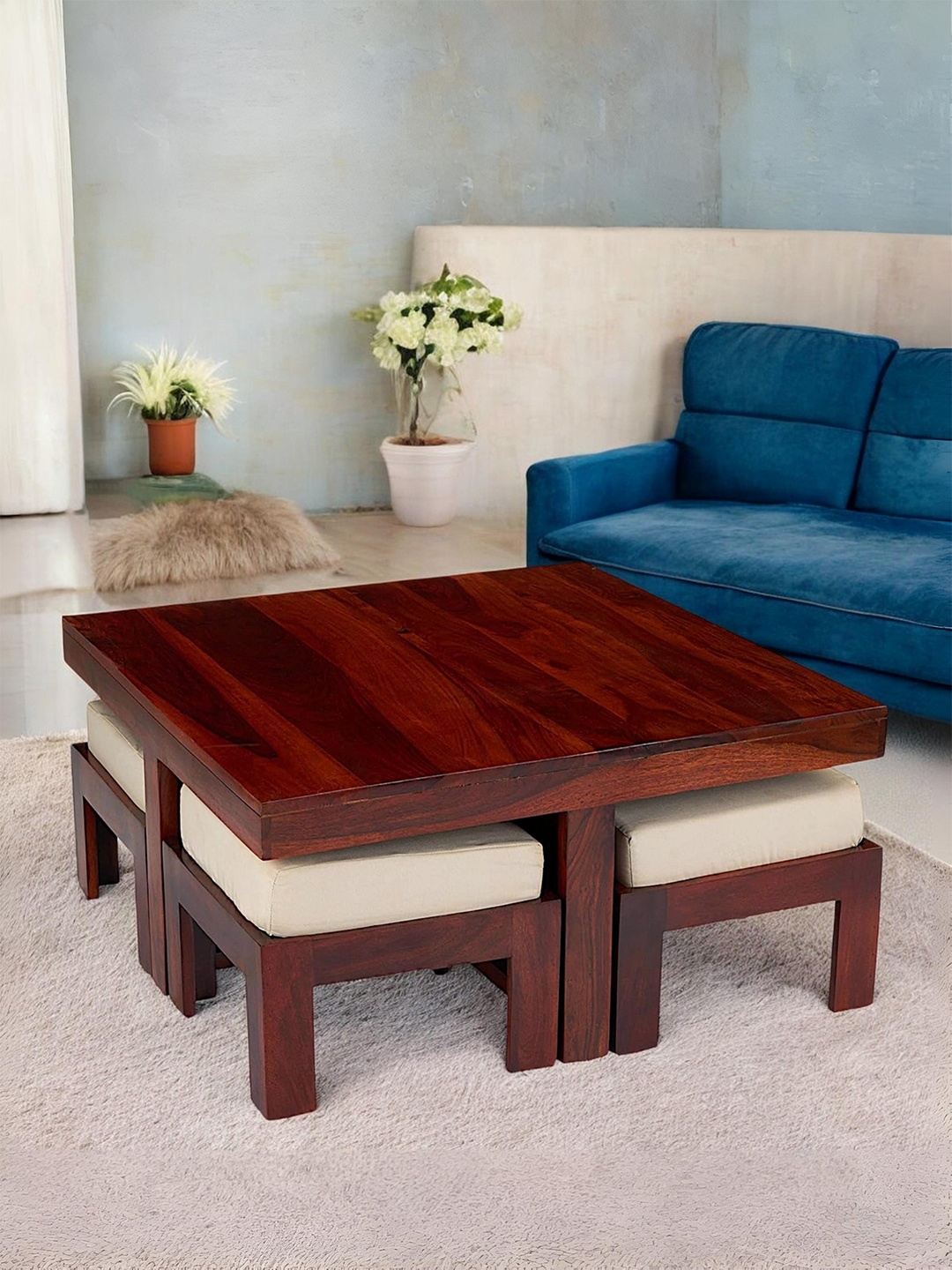 

Ikiriya Red Textured Wooden Honey Finish Coffee Table With Stool and Cushions