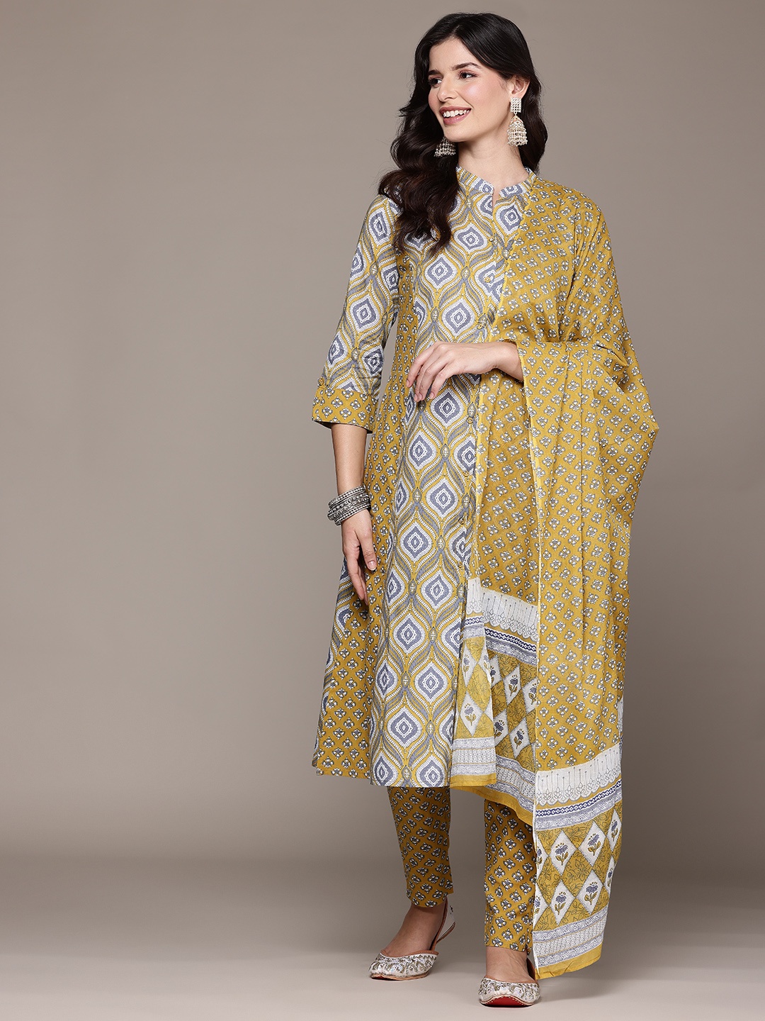 

Readiprint Ethnic Motifs Printed Panelled Pure Cotton Kurta Set, Mustard