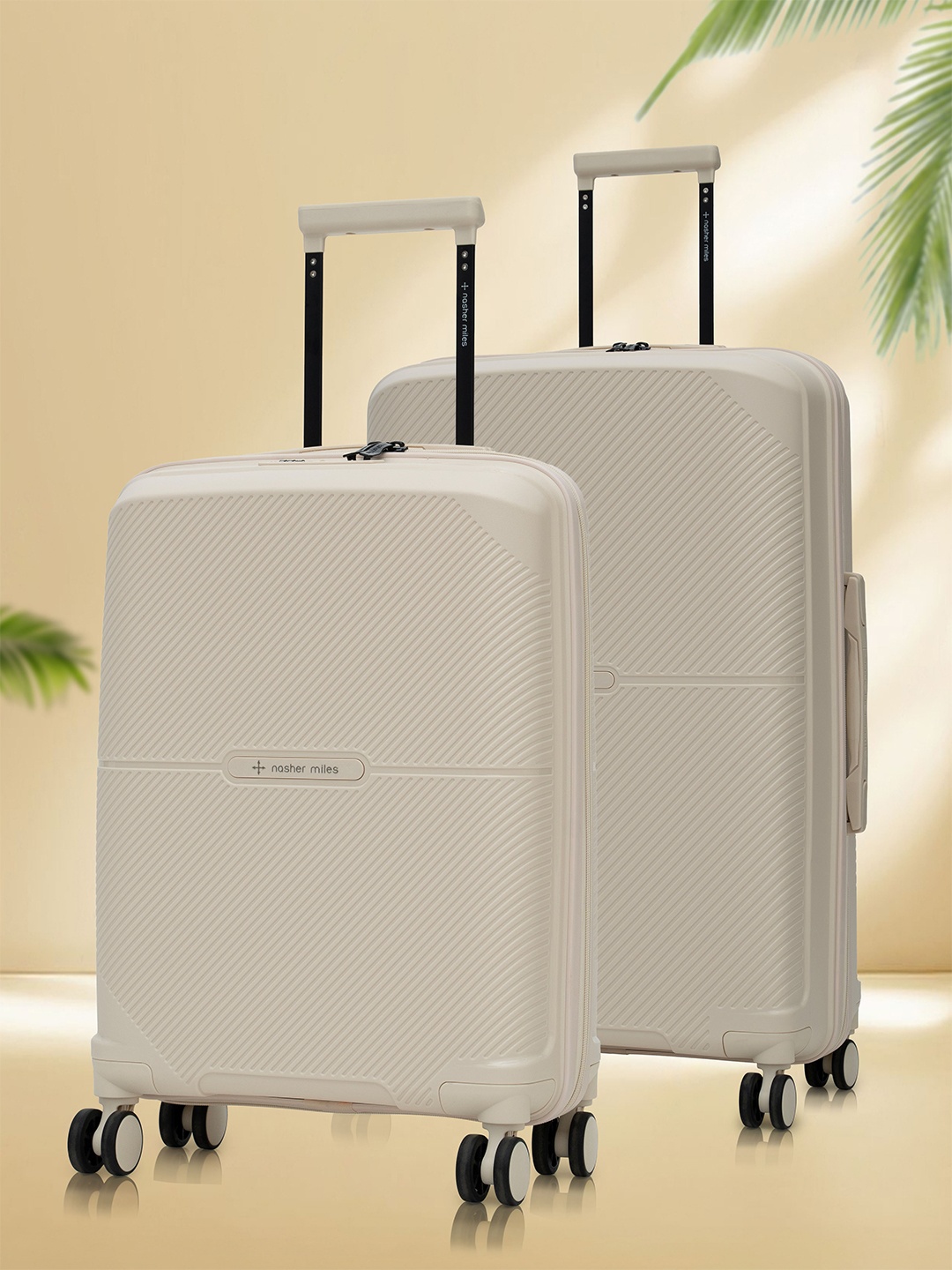 

Nasher Miles Hawaii Polypropylene TSA Lock Set of 2 S/M White Trolley Bags (55-65 cm)