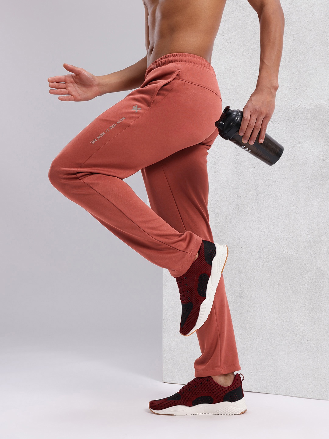 

HRX by Hrithik Roshan Men Reflective Typography Detail Rapid-Dry Running Track Pants, Rust