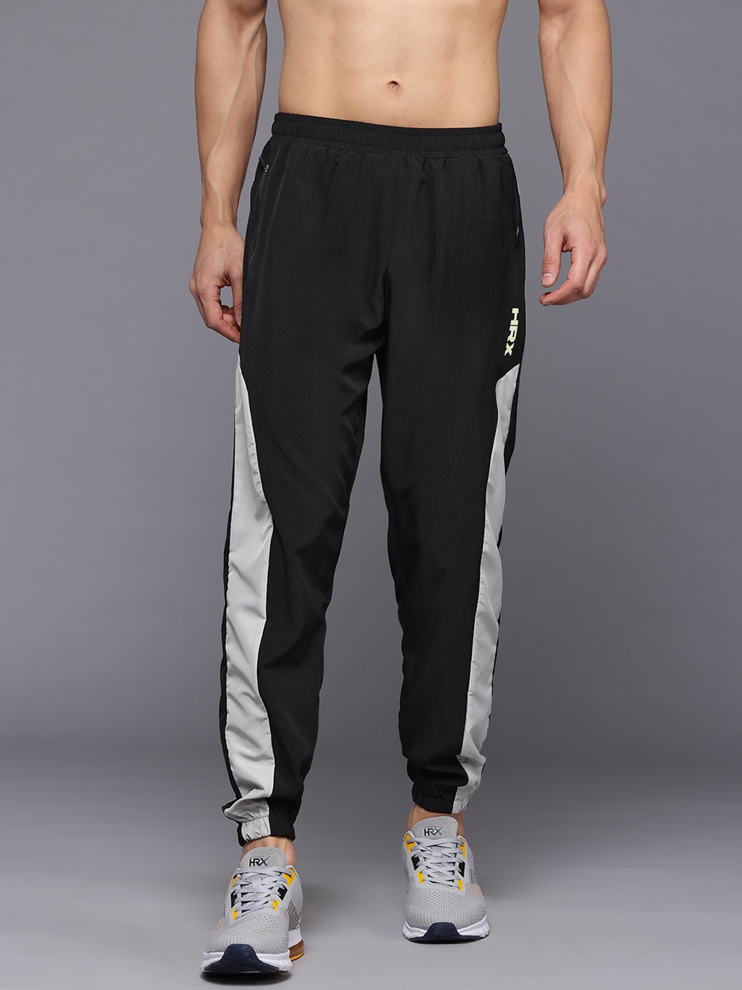 

HRX by Hrithik Roshan Men Rapid-Dry Running Track Pants with Toggle-Hem, Black