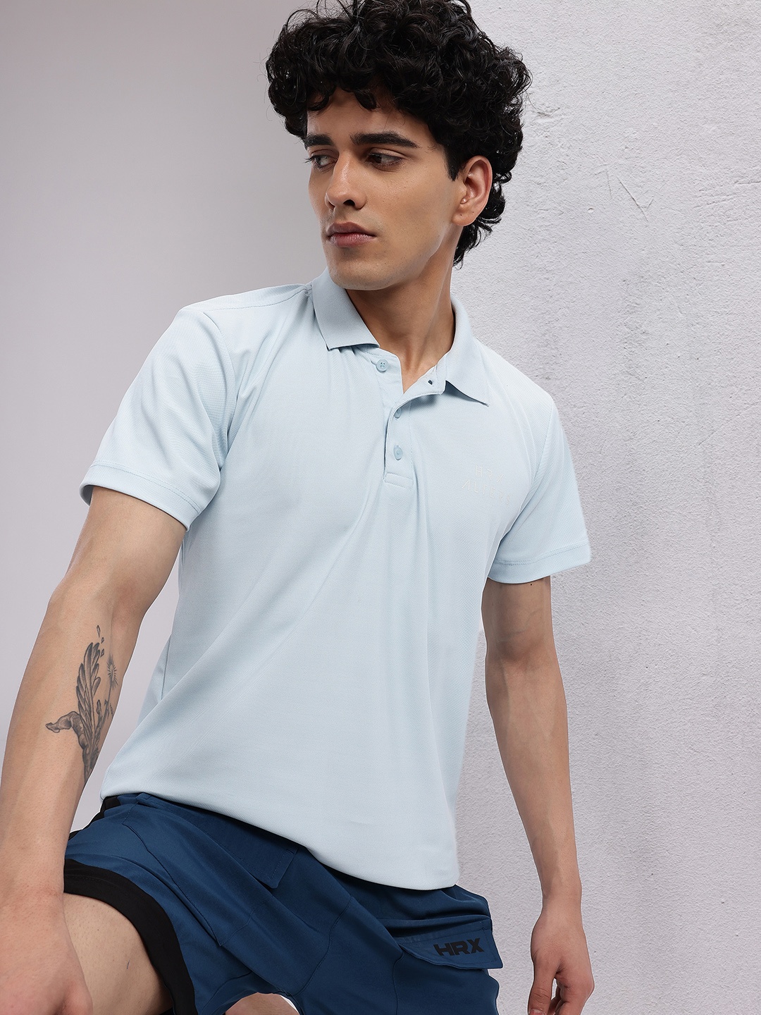 

HRX by Hrithik Roshan Men Polo Collar Lifestyle T-shirt, Blue