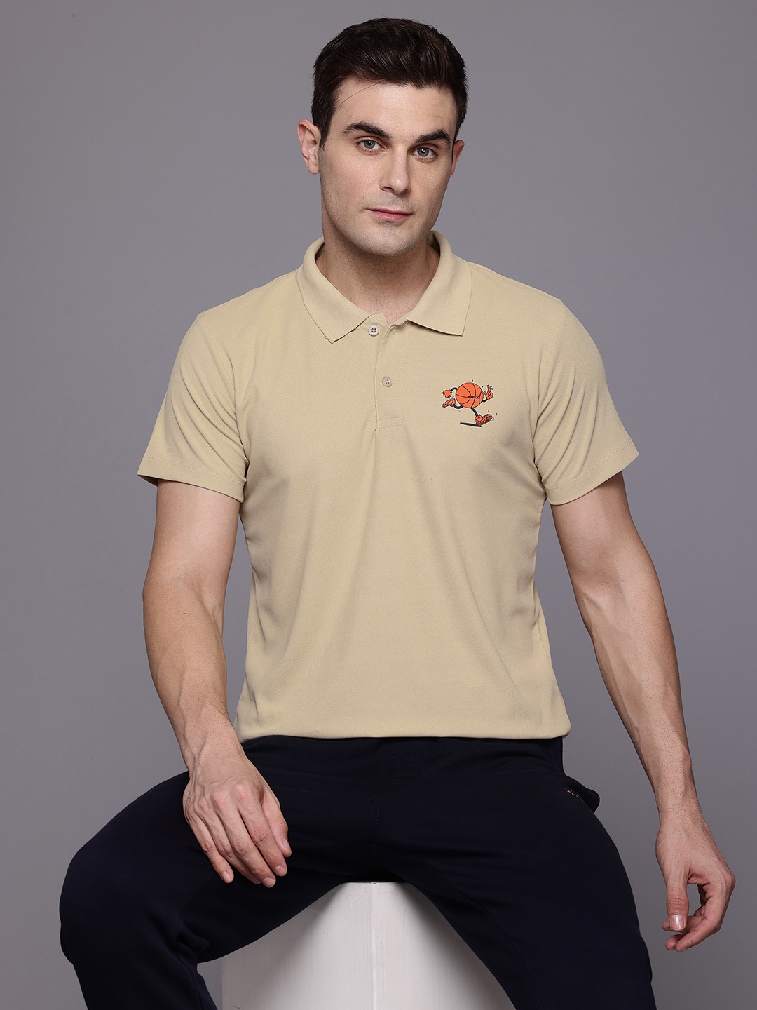

HRX by Hrithik Roshan Graphic Placement Print Polo Collar Lifestyle T-shirt, Beige