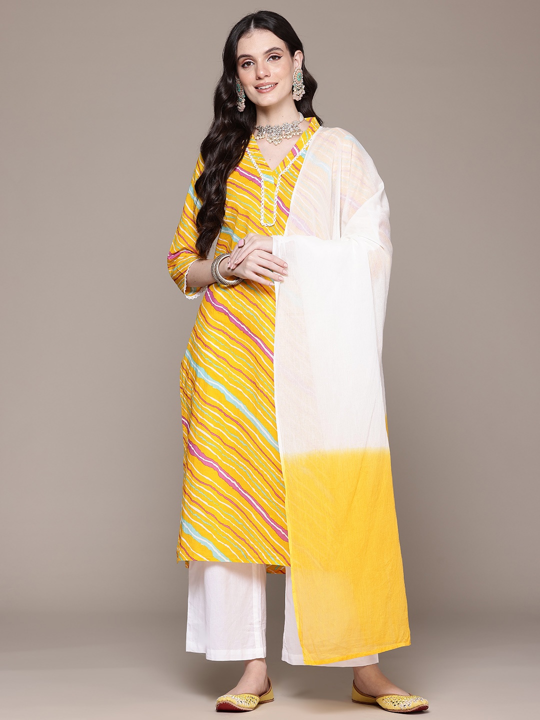 

Readiprint Fashions Leheriya Printed Beads & Stones Pure Cotton Kurta Set, Yellow