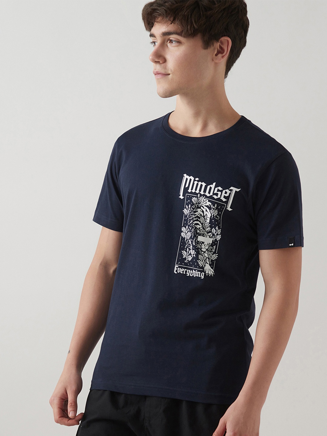 

Bewakoof Men Graphic Printed Round Neck Pure Cotton T-shirt, Blue