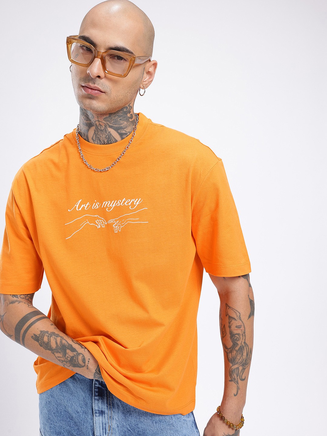 

glitchez Mystery Vibes Printed Oversized T-shirt, Orange