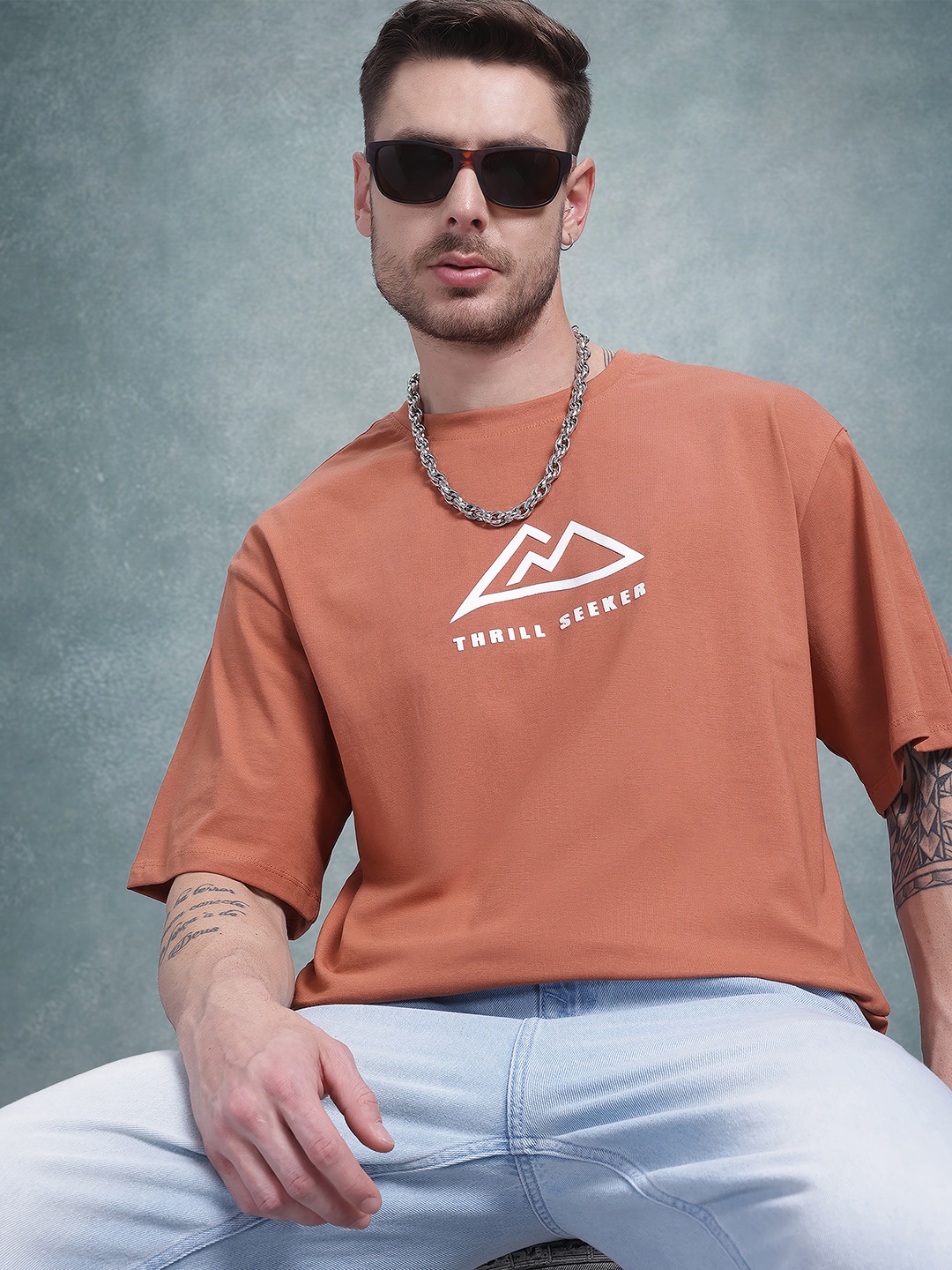 

The Roadster Life Co. Men Typography Printed Pure Cotton Relaxed Fit T-shirt, Rust