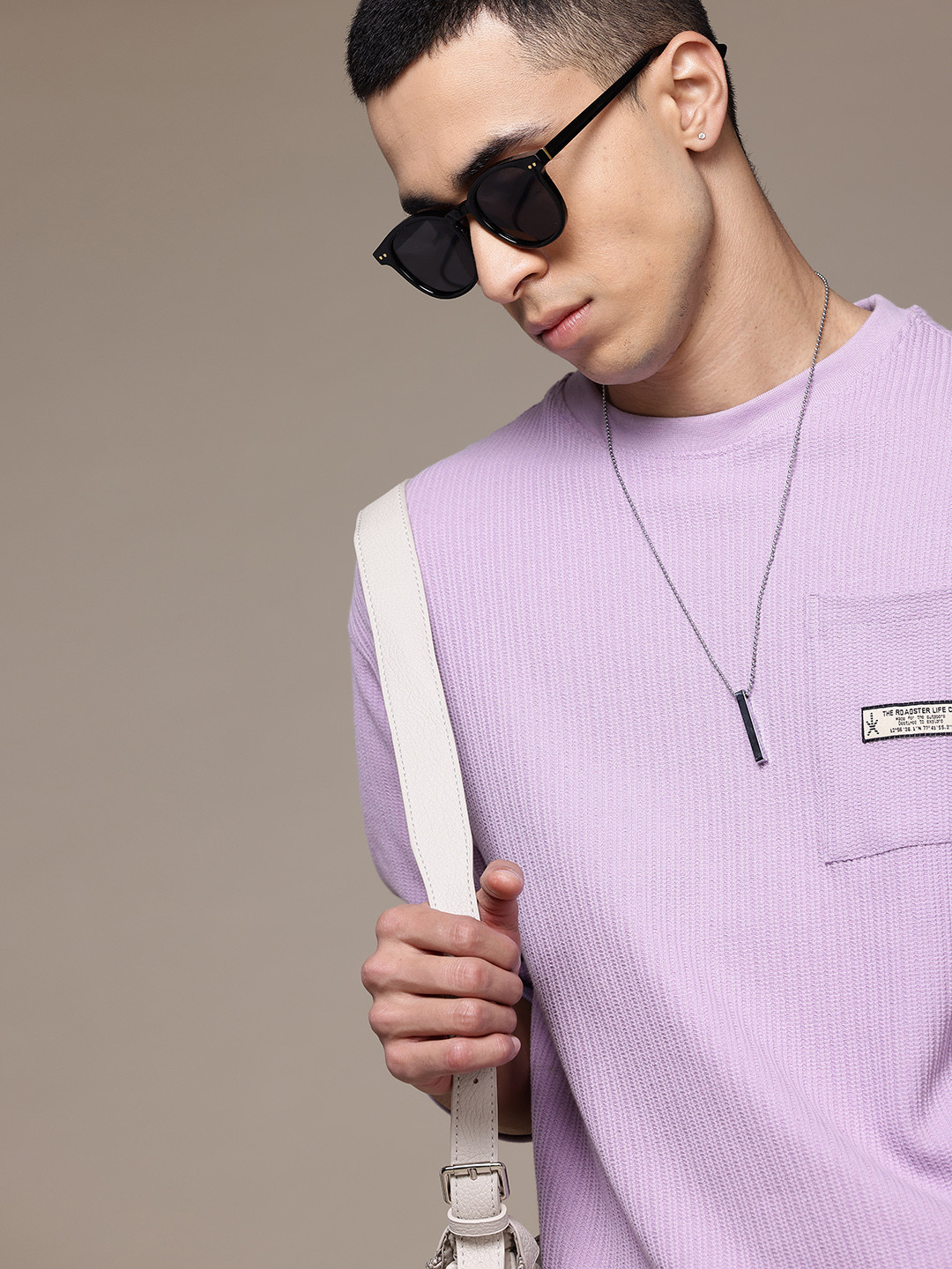 

The Roadster Lifestyle Co. Men Self Design Relaxed Fit T-shirt, Lavender