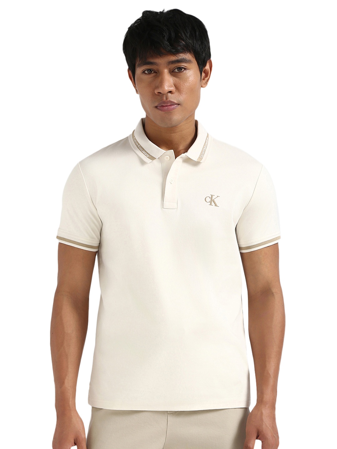 

Calvin Klein Jeans Men Solid Polo Collar Cotton Slim Fit T-shirt, Beige