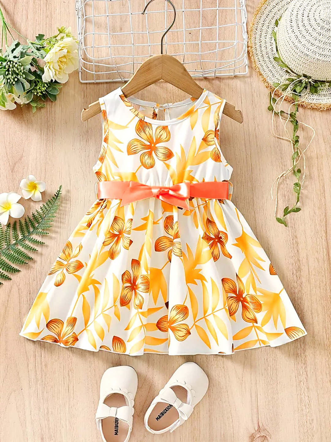 

OMPAX Girls Floral Print Round Neck Sleeveless Fit & Flare Tie-Ups Dress, Yellow