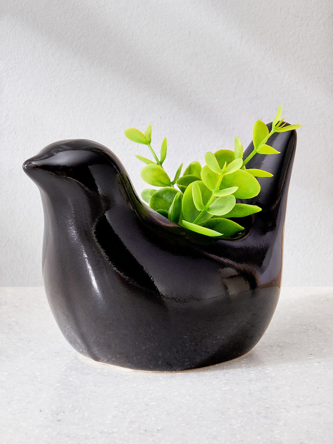

Home Centre Black Ceramic Bird Planter