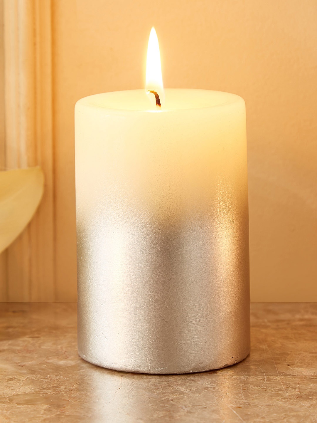 

Home Centre Eternity Viva Silver-Toned Cylindrical Shaped Pillar Candle