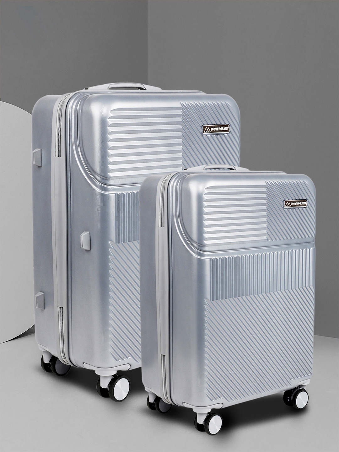 

MOVE-MEANT VoyageWare Polycarbonate 8 wheel Hard Small & Medium Trolley Suitcase, Silver