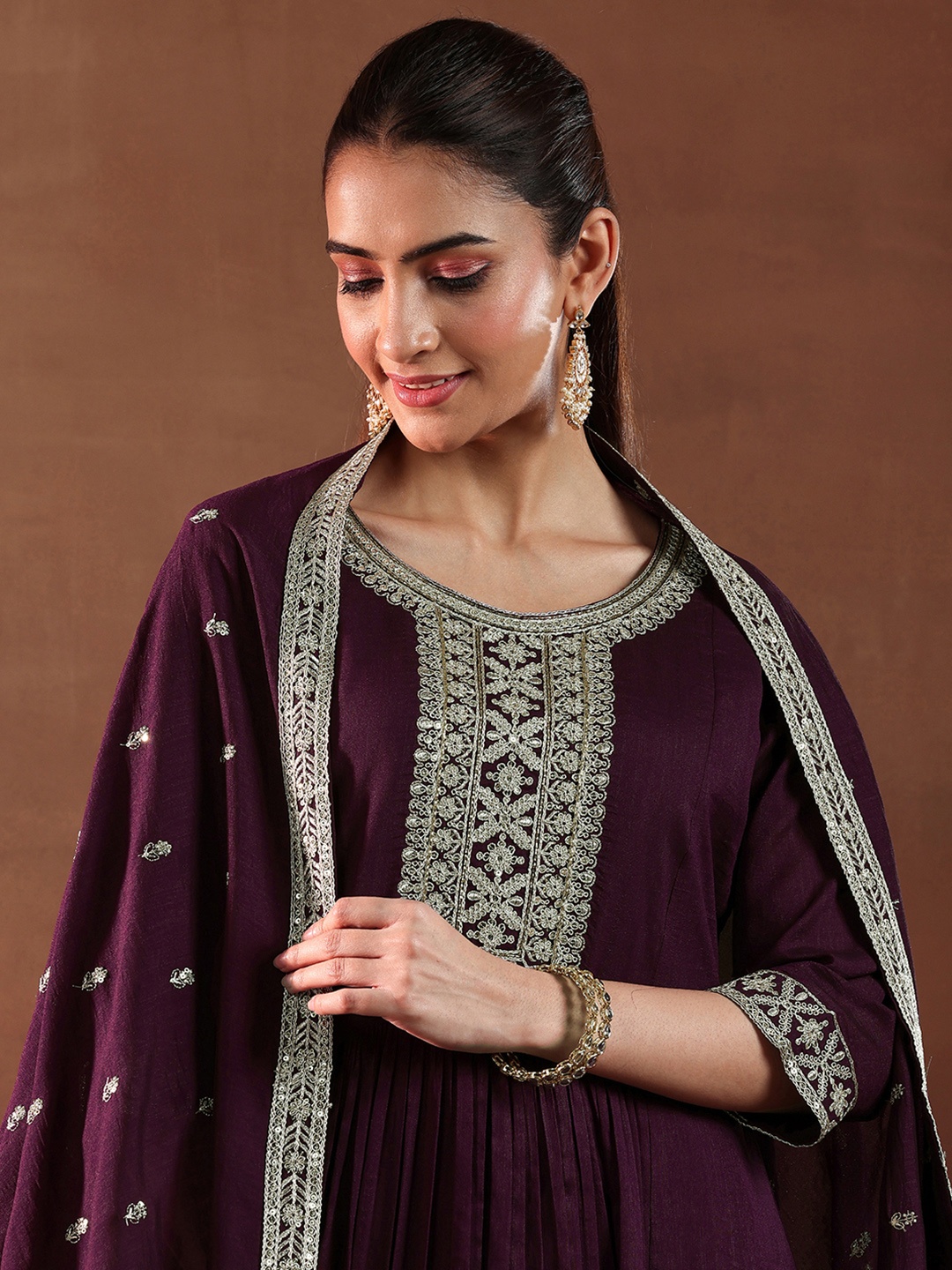 

Libas Burgundy Ethnic Motifs Yoke Design Pleated Sequinned Kurta with Trouser & Dupatta