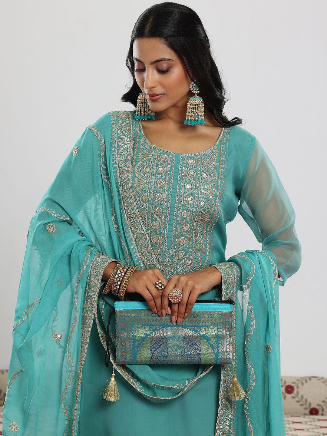 

Libas Sea Green Ethnic Motifs Yoke Design Sequinned Straight Kurta with Trouser & Dupatta