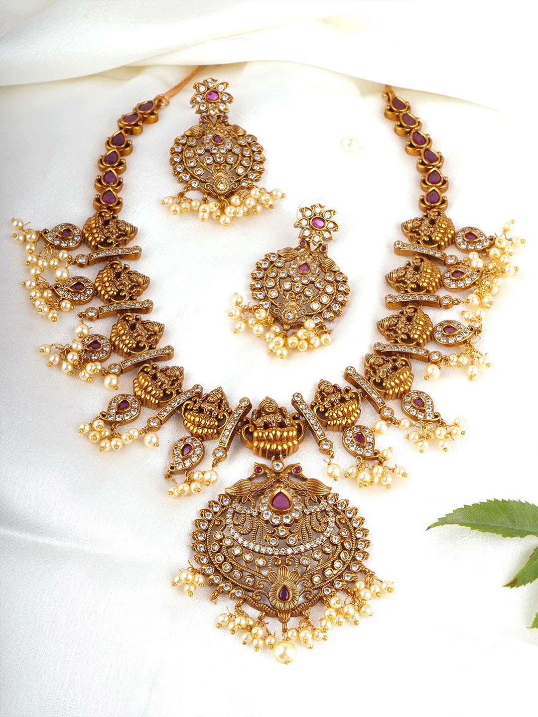 

Adwitiya Collection Gold-Plated Stone Studded Necklace and Earrings