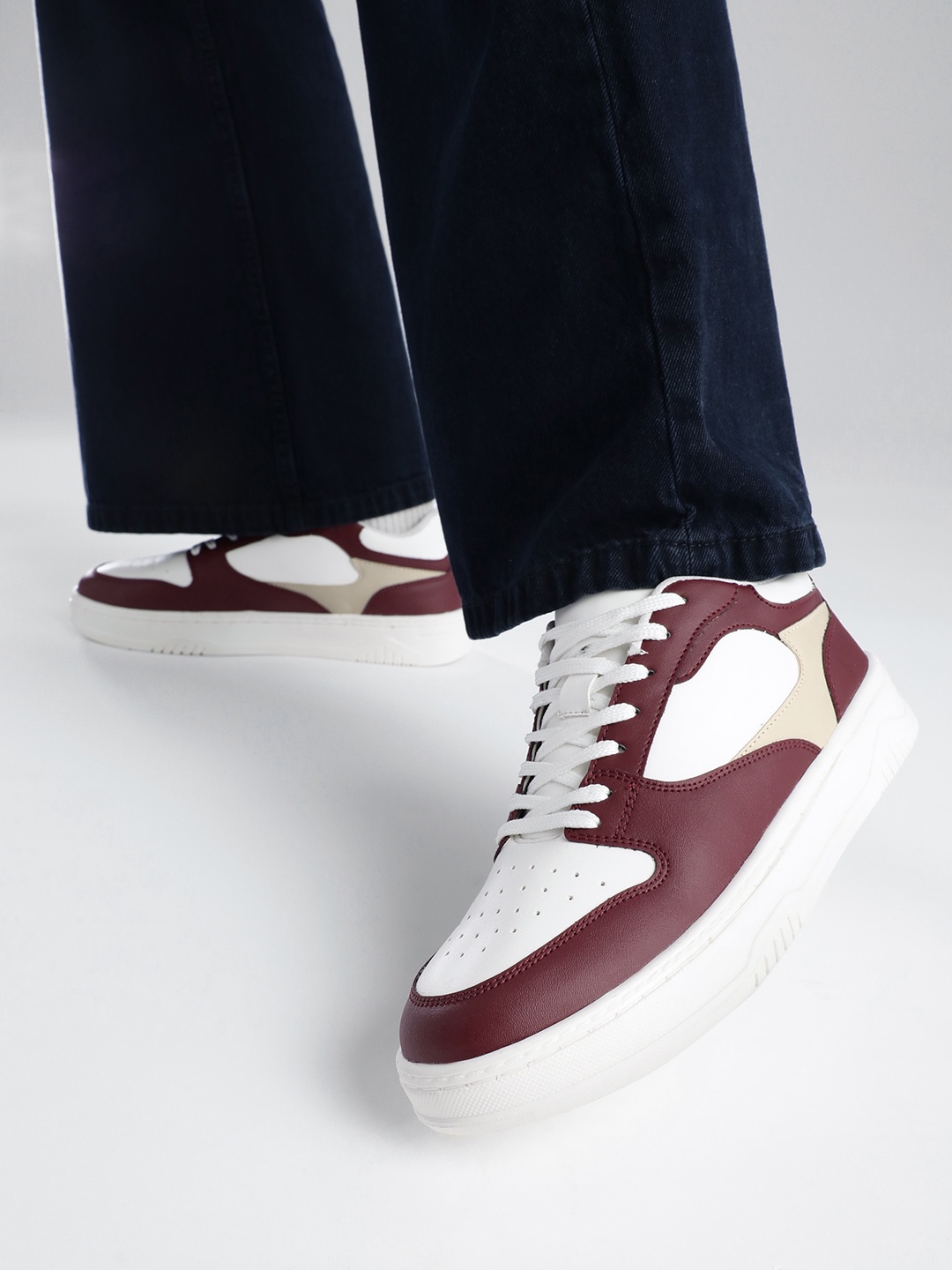 

Roadster The Life Co. Women Colourblocked Perforated Sneakers, Maroon