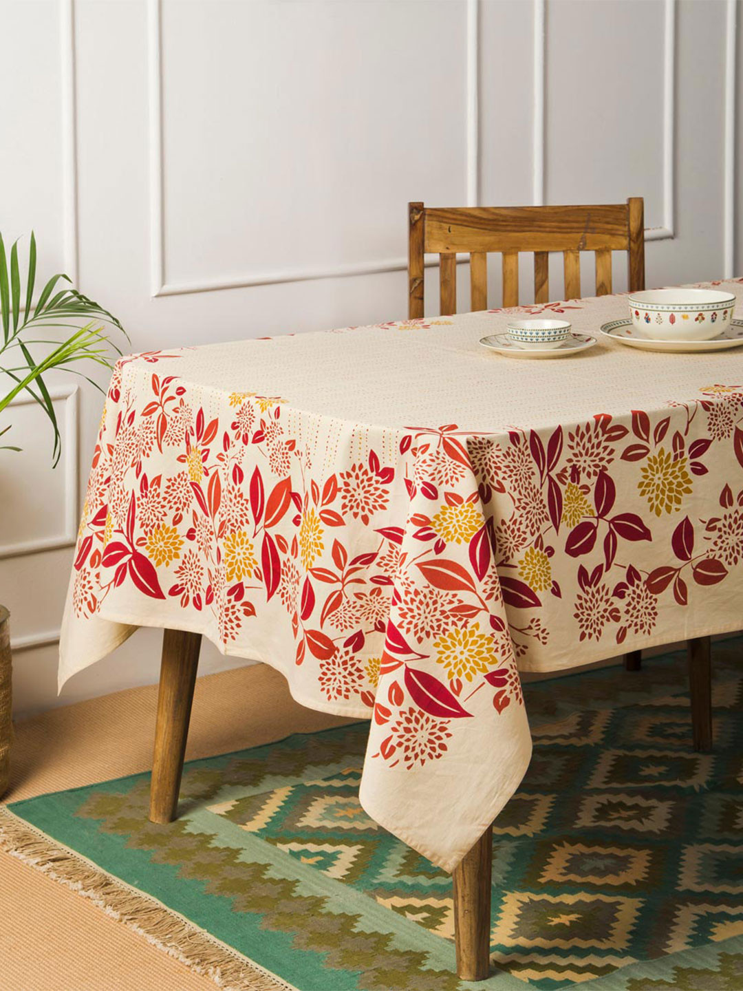 

Fabindia Neer Red & Cream Colored Floral Printed Cotton 6 Seater Table Cover