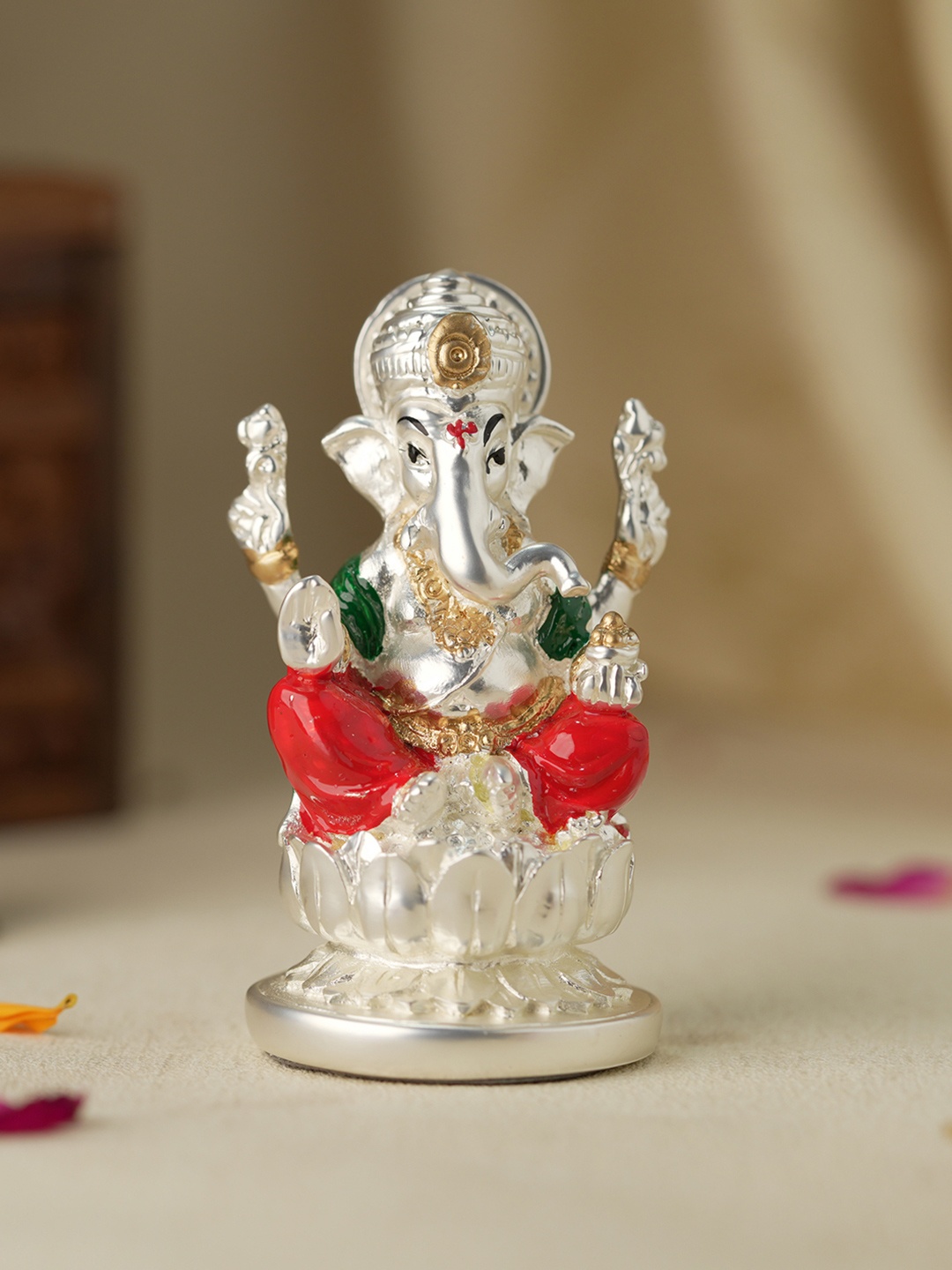 

Voylla Silver-Toned Religious Lord Ganesha Idol Showpiece