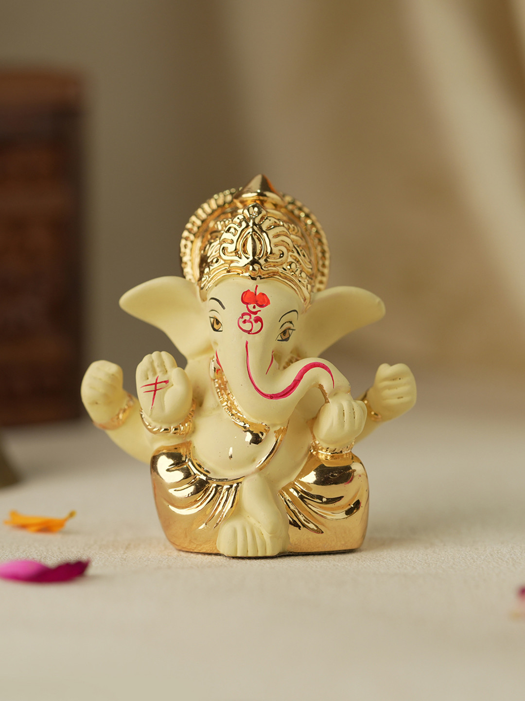 

Voylla Gold-Toned Religious Lord Ganesha Idol Showpiece