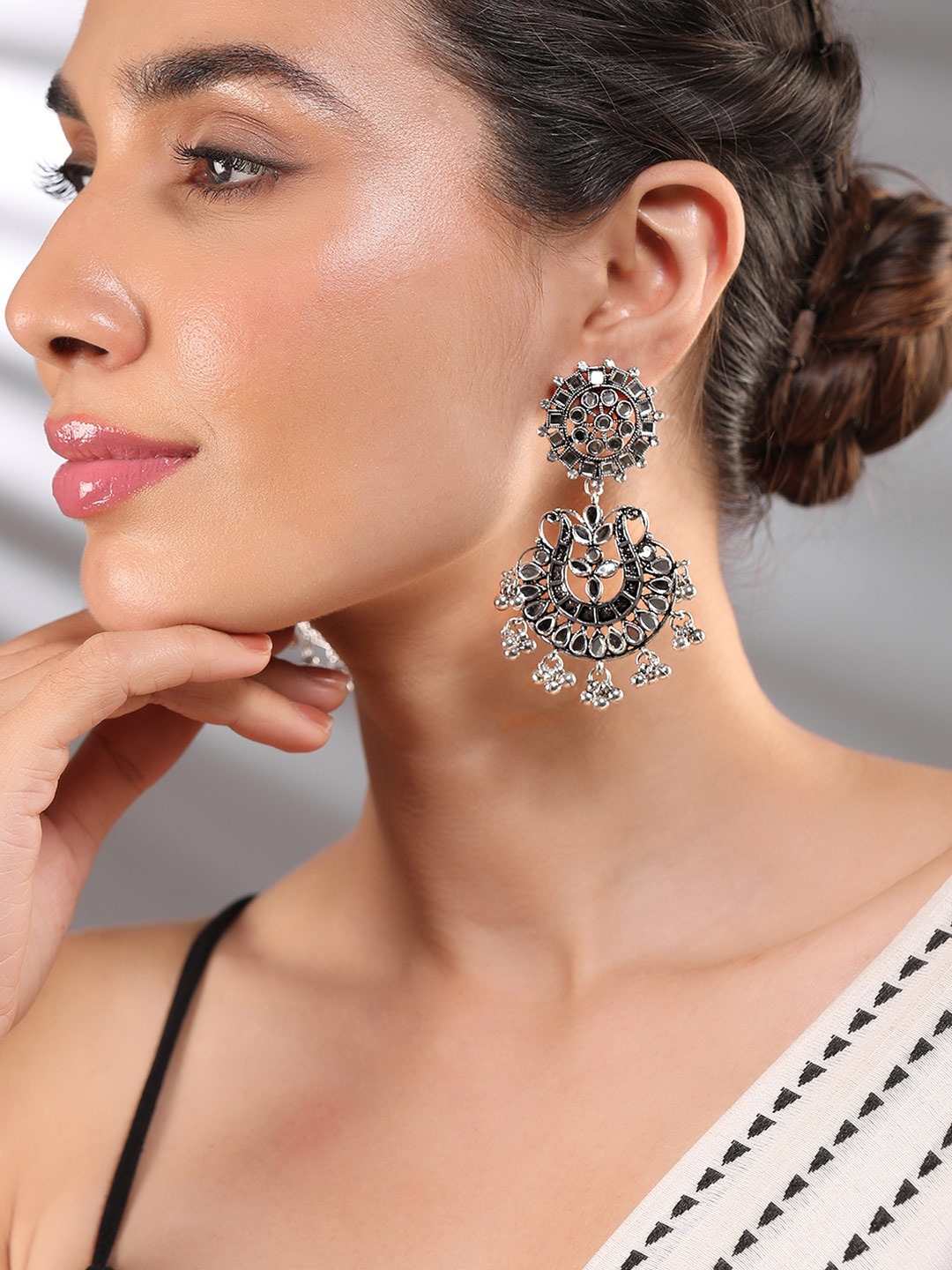 

Rubans Oxidized Silver-Plated Kundan Studded Intricate Floral Design Chandbali Earrings