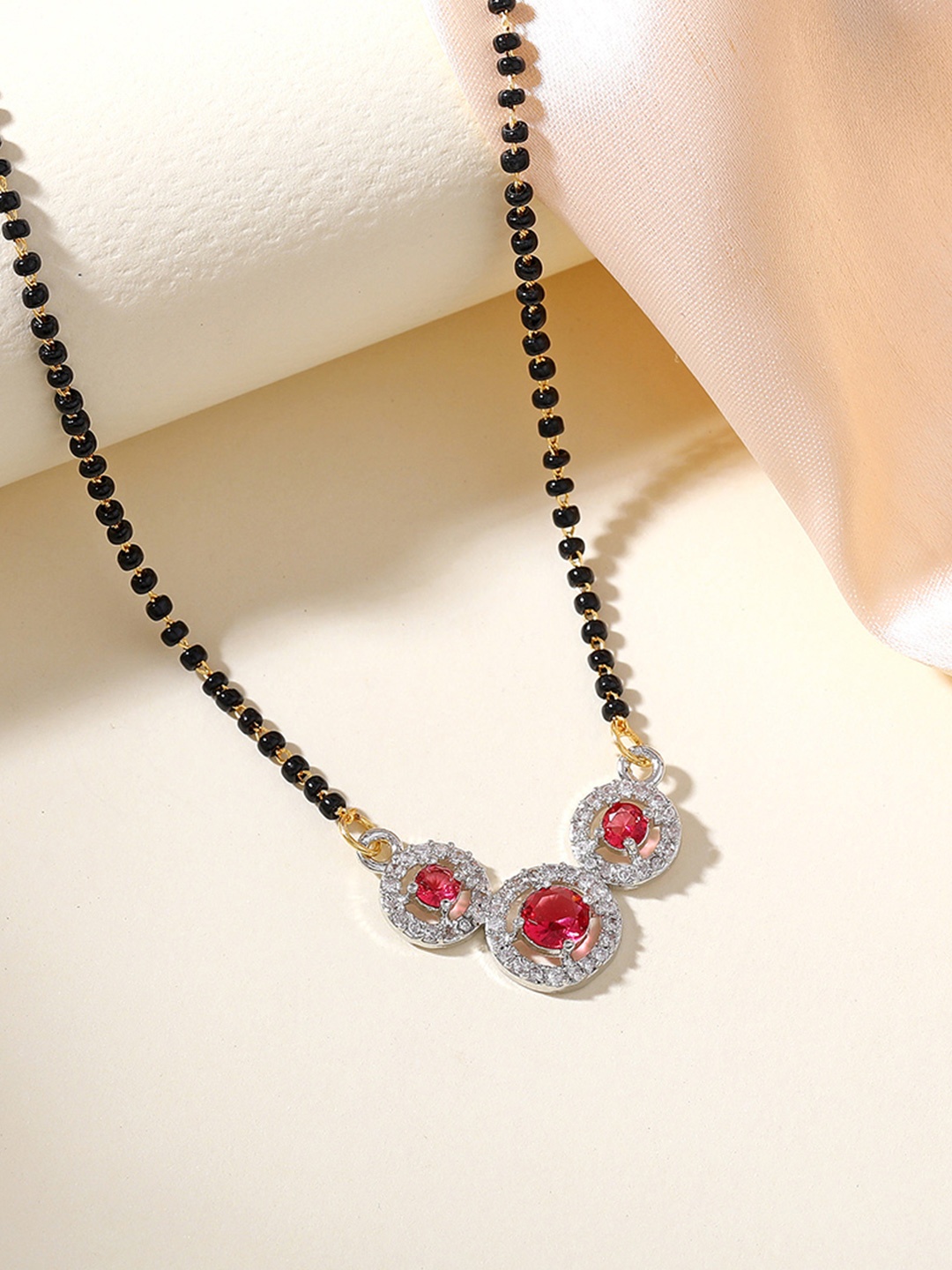 

Estele Gold-Plated Crystals Studded Mangalsutra