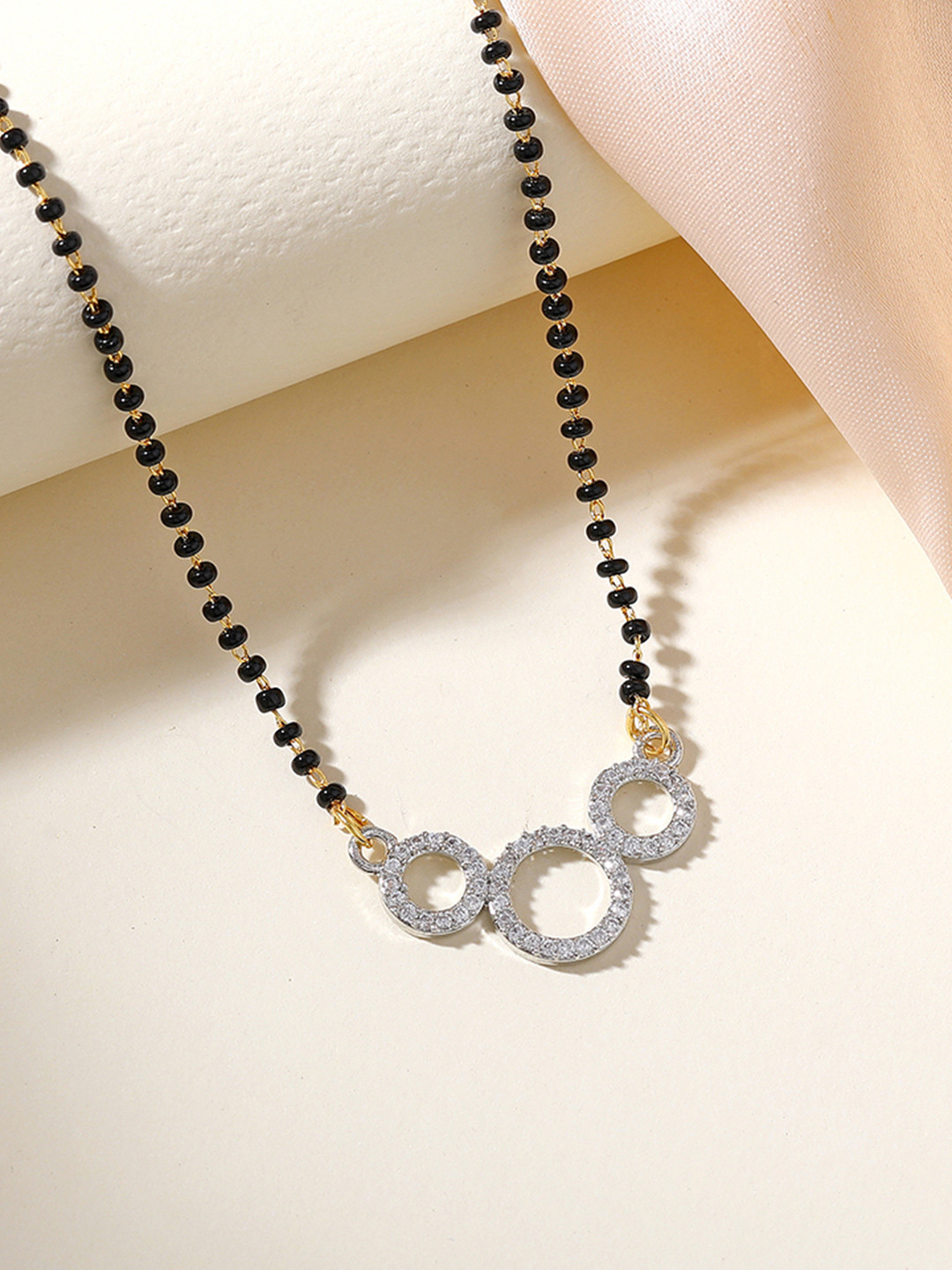 

Estele Gold-Plated Crystals Studded Mangalsutra