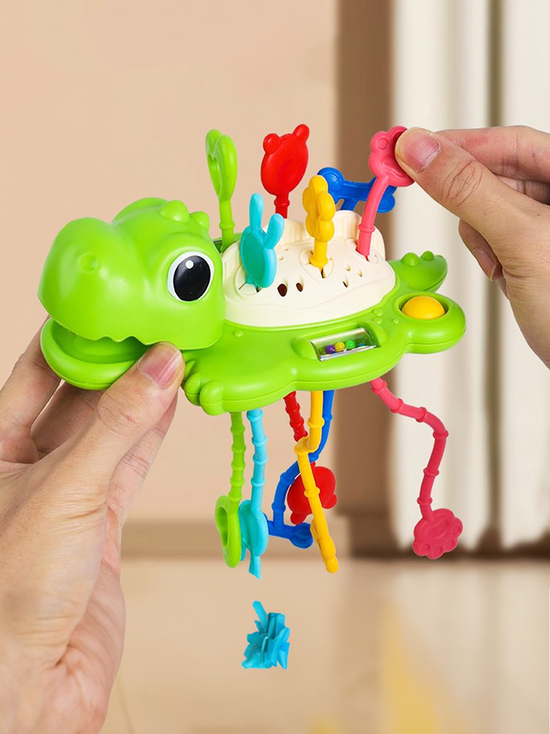 

Kidology Kids Dinosaur Pull String Teething Toy, Green