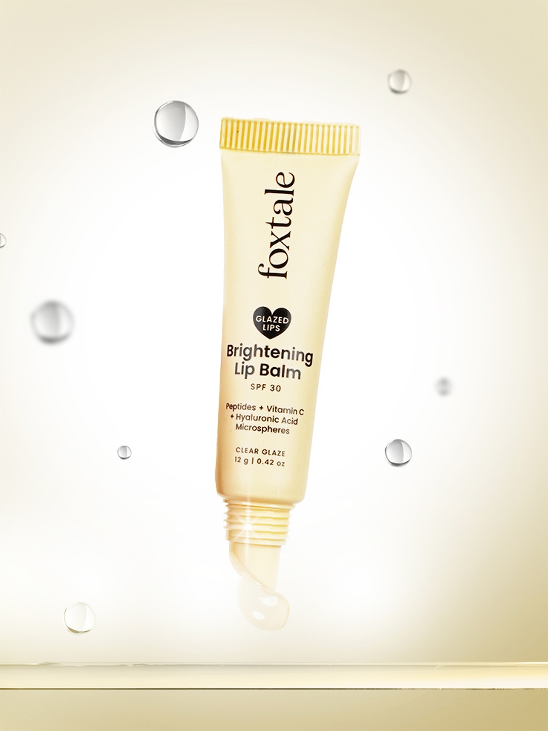 

FoxTale Brightening SPF30 Peptides Vitamin C & Hyaluronic Acid Lip Balm 12g - Clear Glaze, White