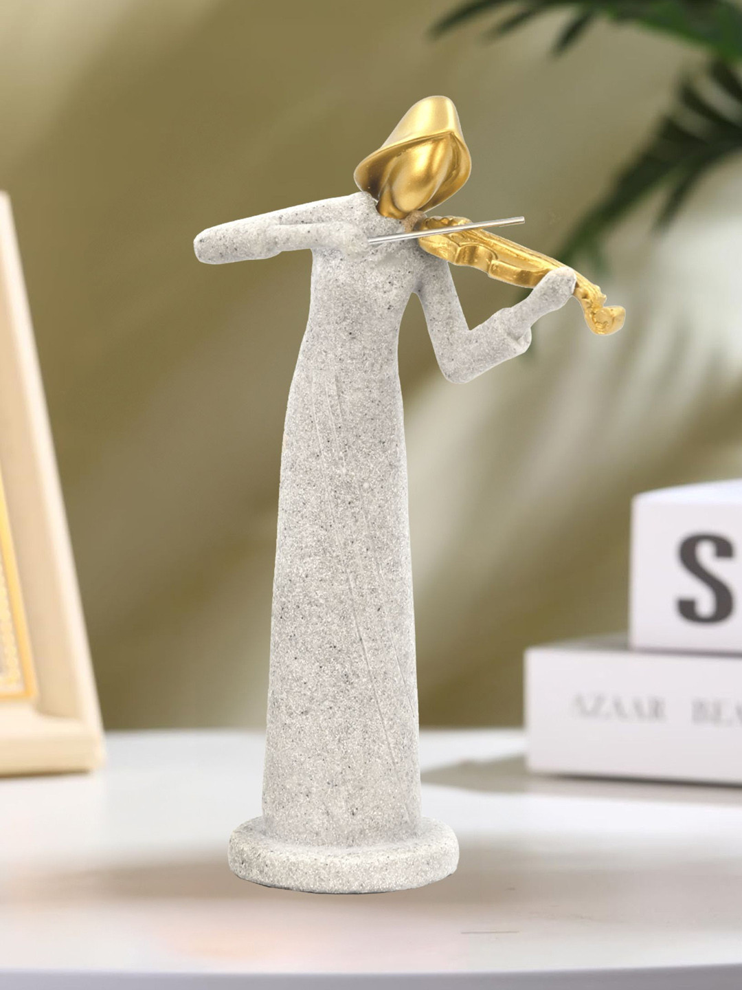 

Aura White & Gold-Toned Other Figurine Showpiece