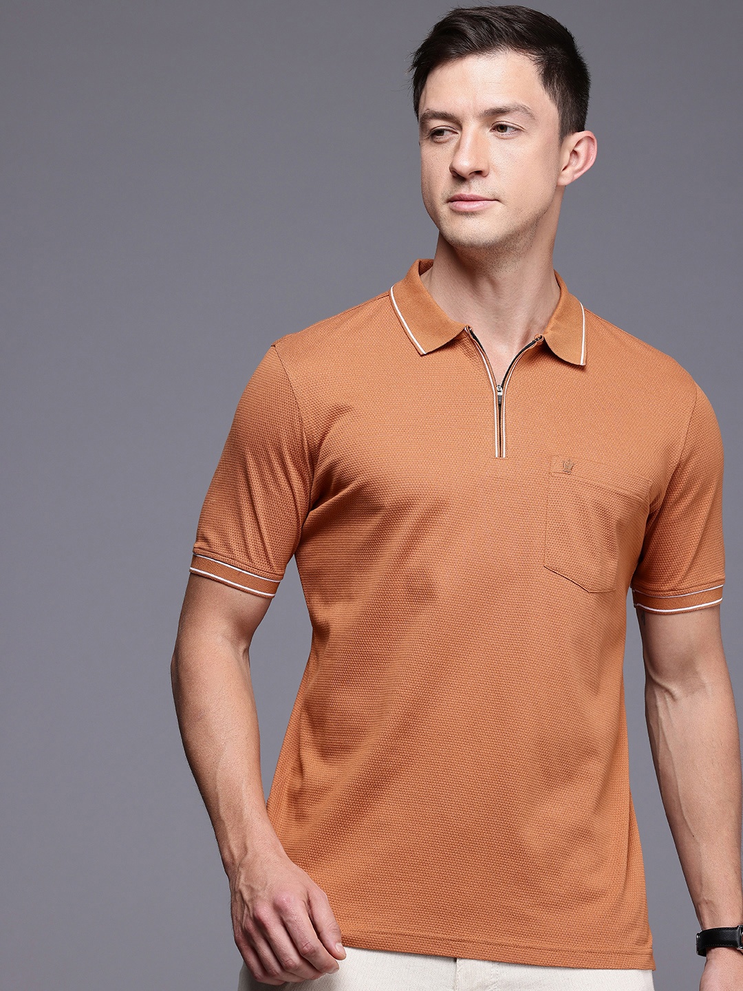 

Louis Philippe Polo Collar Self Design Textured Pure Cotton Pocket T-shirt, Rust