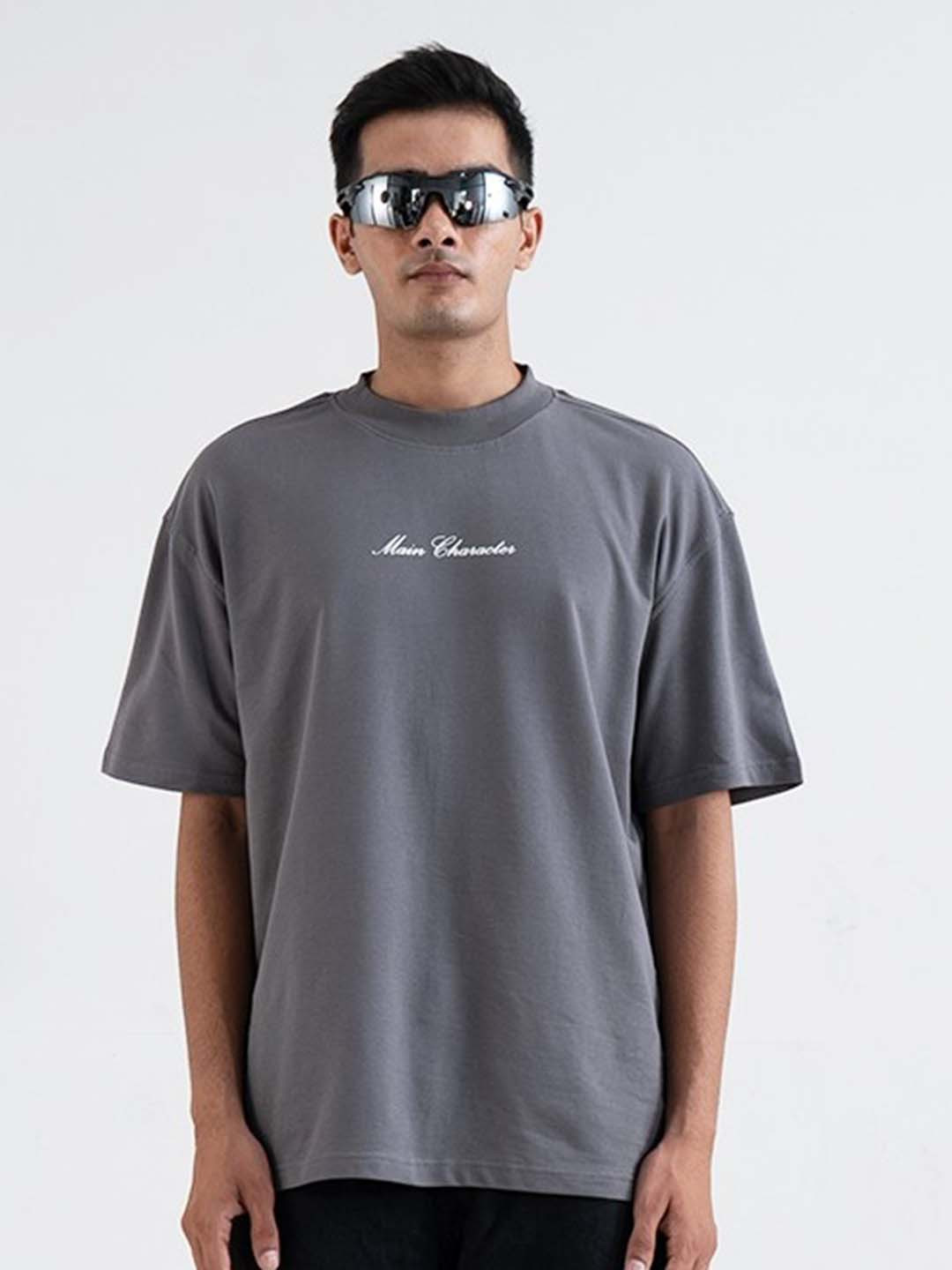 

Main Character India Unisex Typography Printed Drop-Shoulder Sleeves Oversized T-shirt, Grey