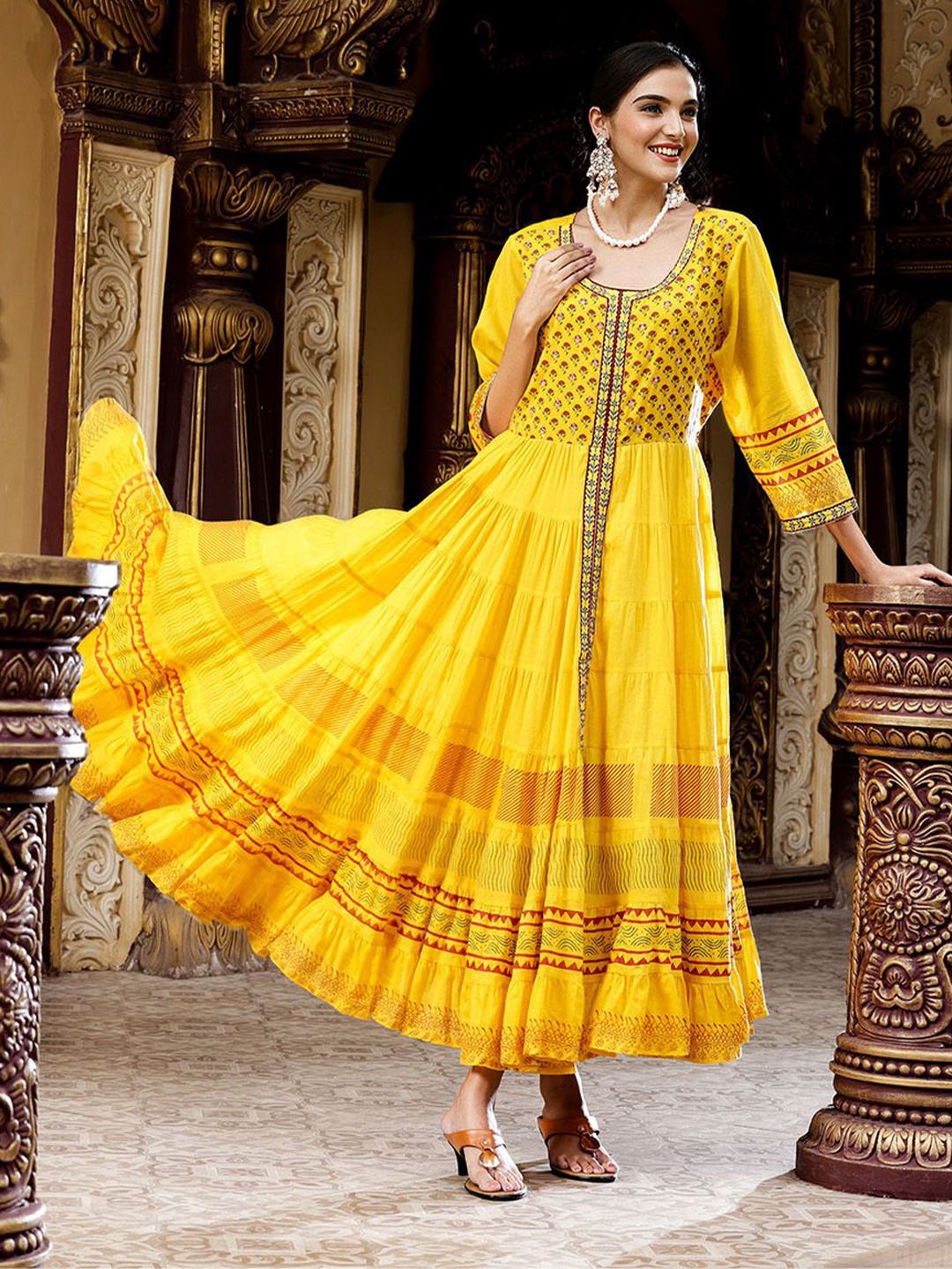 

Ishin Cotton Ethnic Motifs Printed Round Neck Tiered Fit and Flare Maxi Ethnic Dress, Mustard