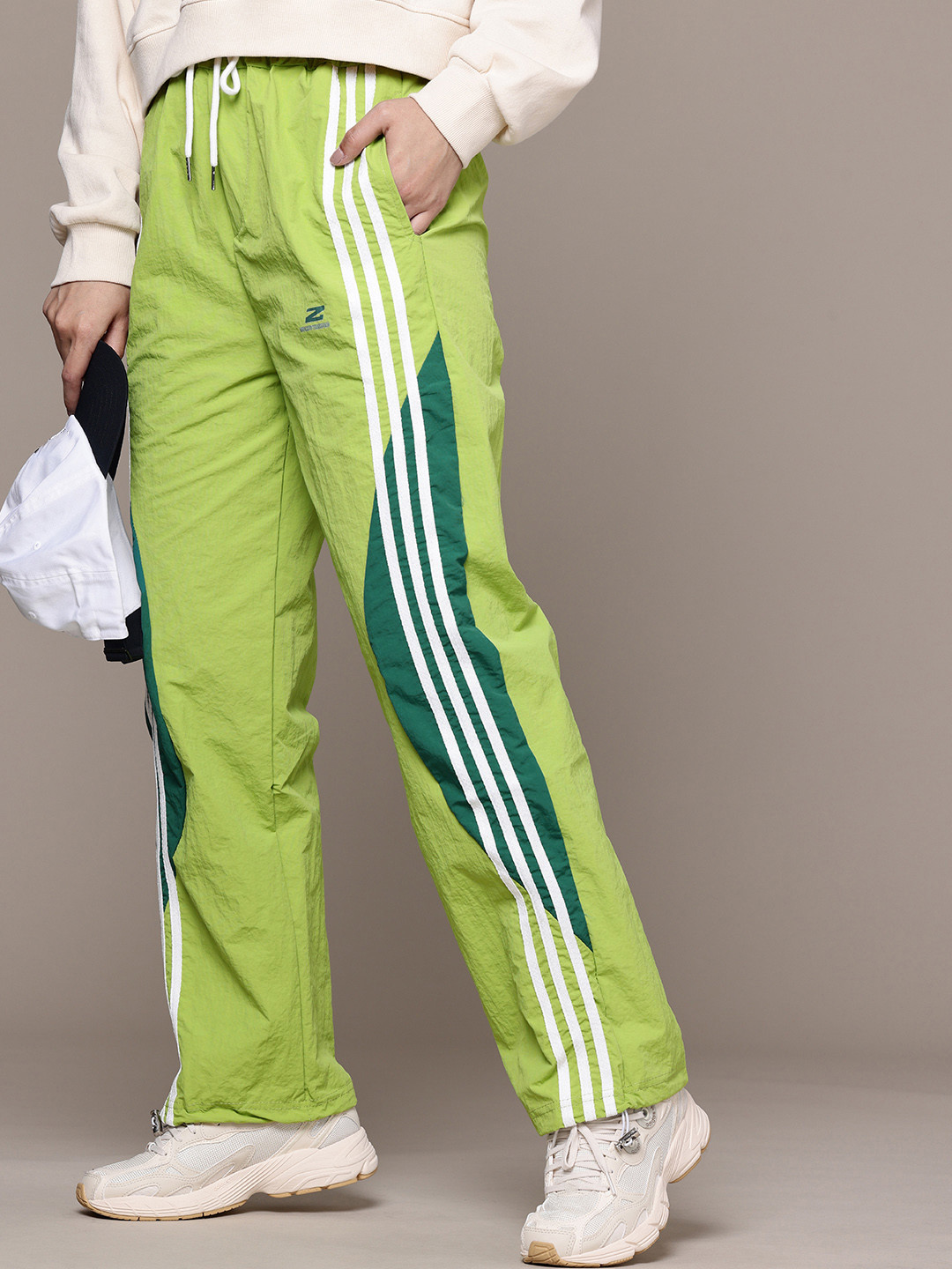 

The Roadster Life Co. Women Striped Relaxed Fit Trousers, Green