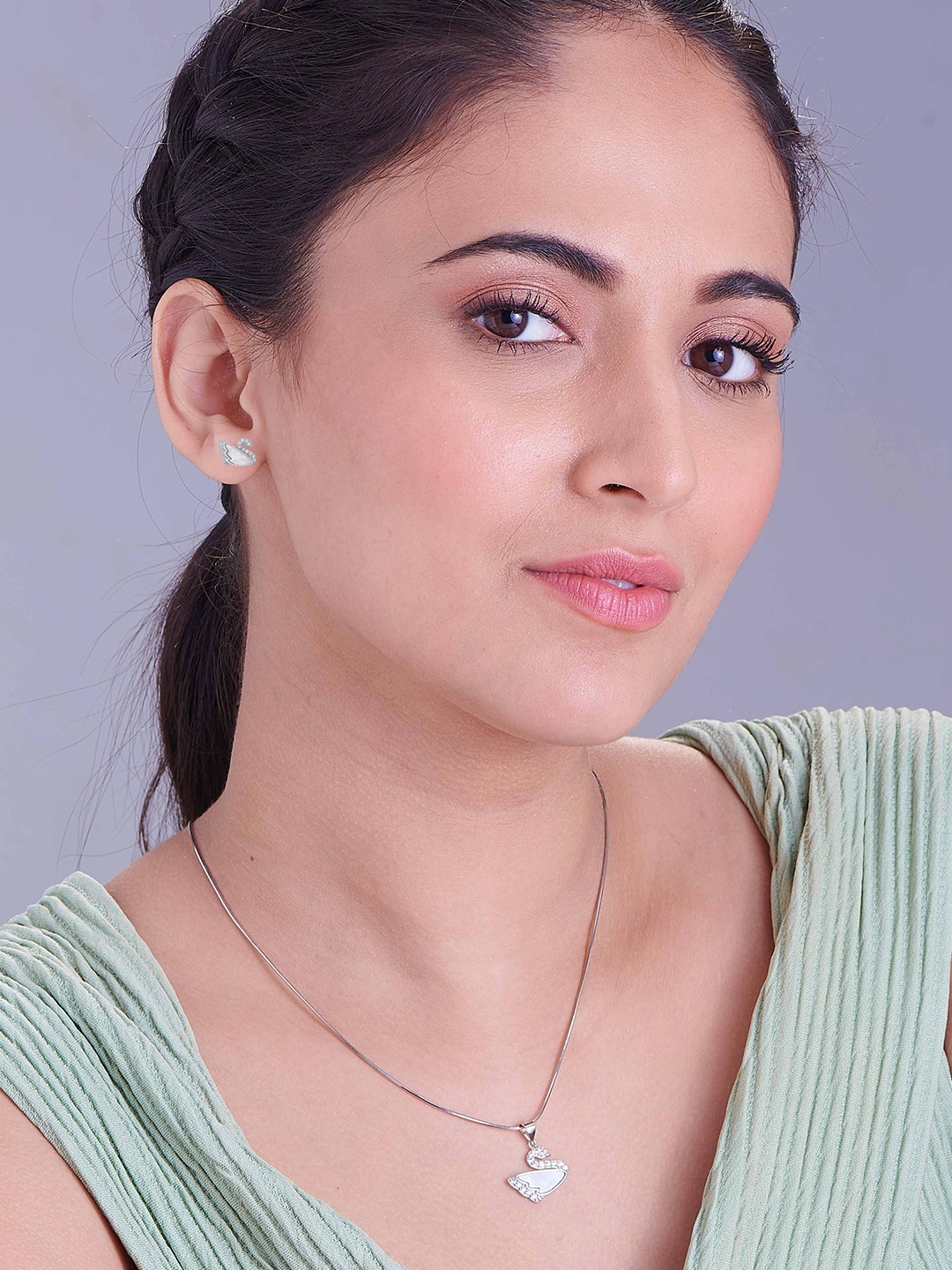

Nipura 925 Sterling Silver Rhodium-Plated CZ Studded Pendant and Earrings