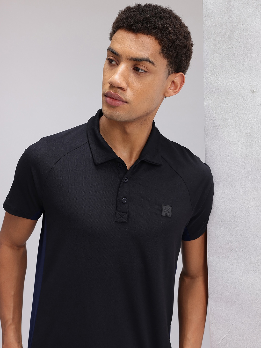 

HRX by Hrithik Roshan Solid Polo Collar T-shirt, Black