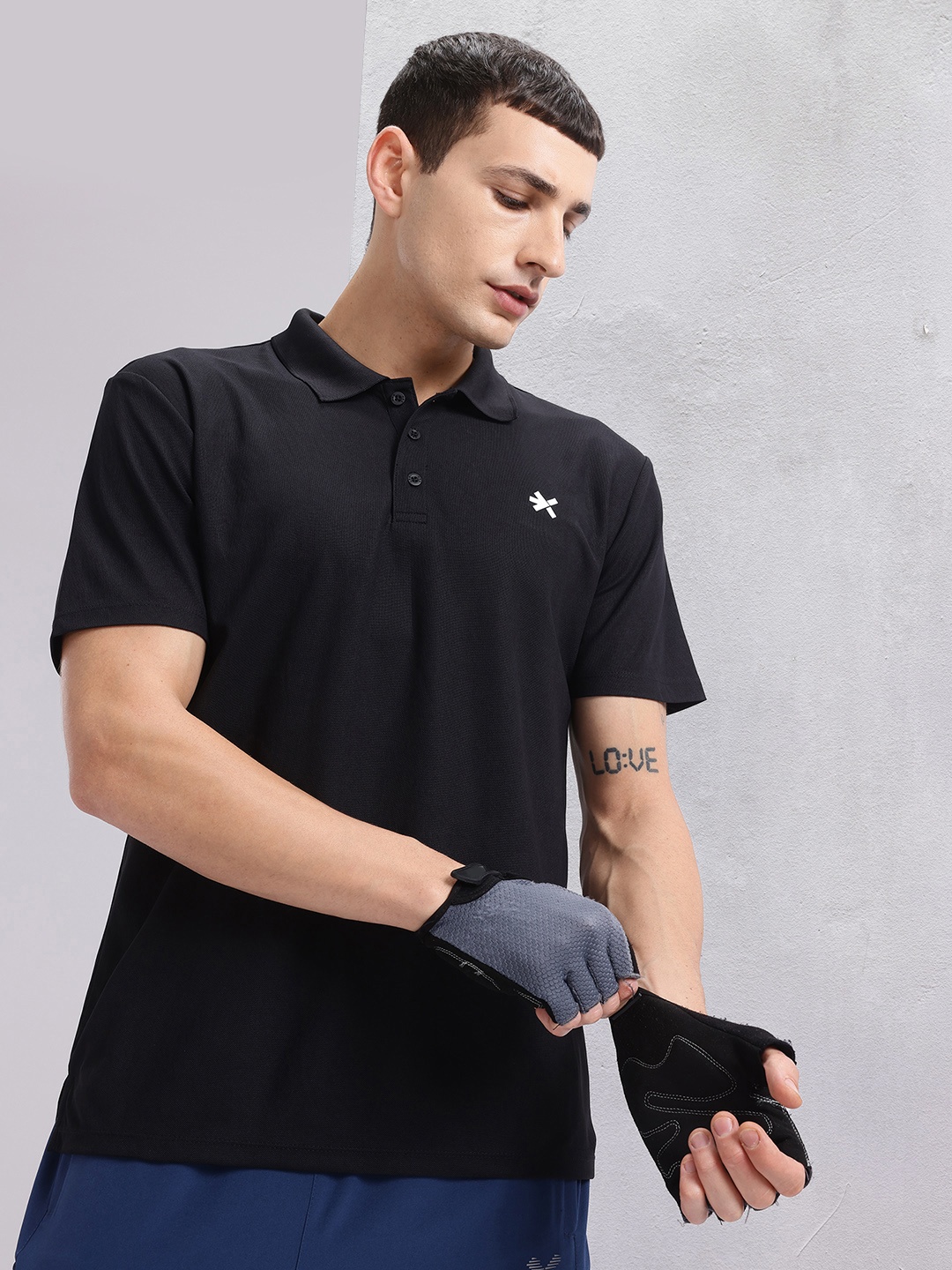 

HRX by Hrithik Roshan Solid Polo Collar T-shirt, Black