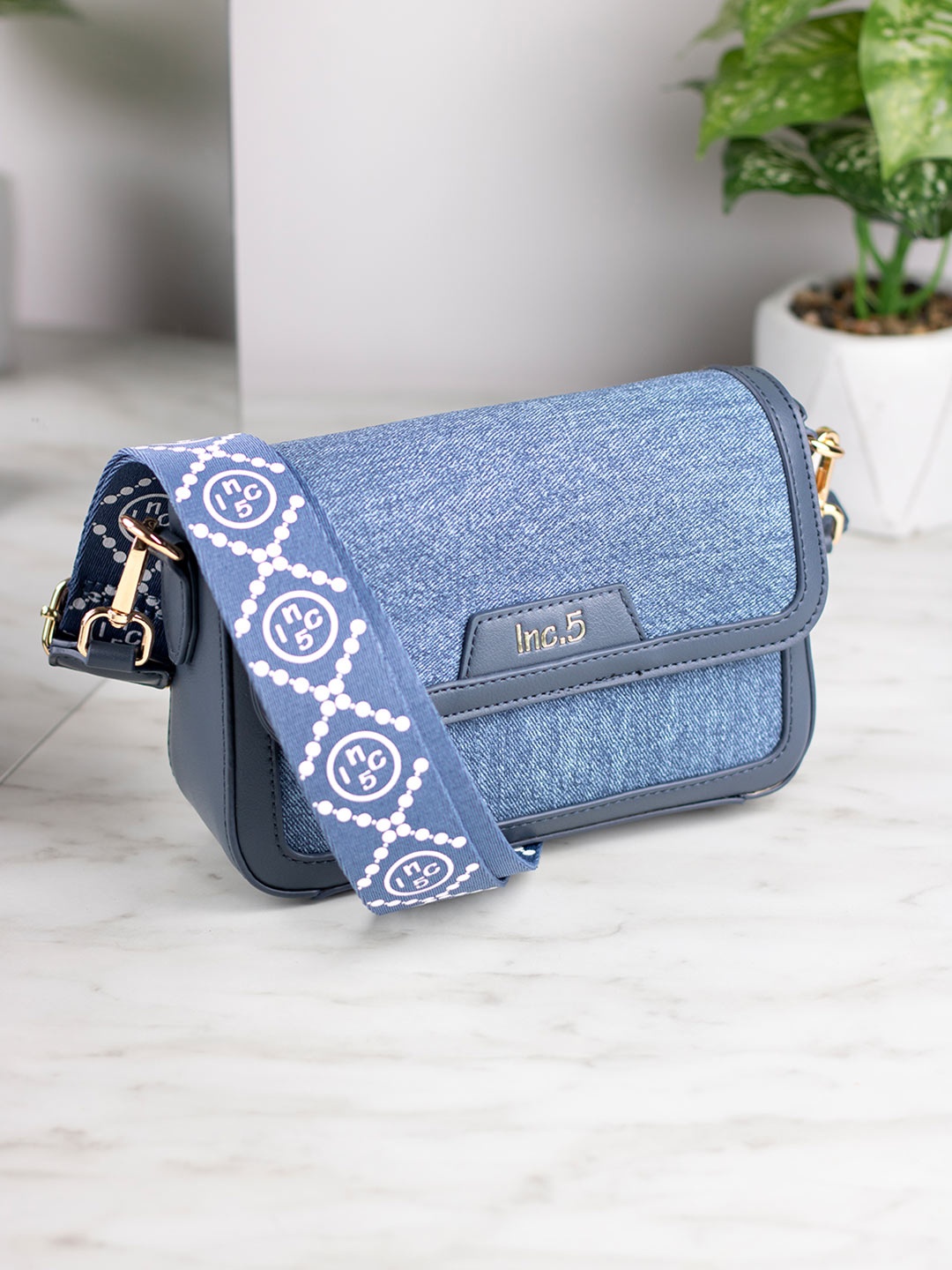 

Inc 5 Textured Sling Bag, Blue