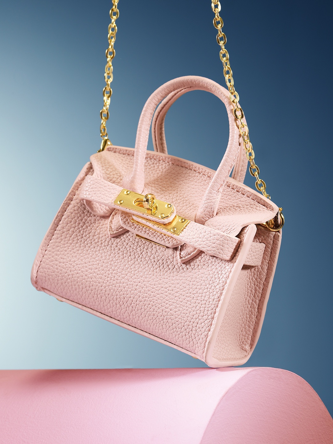 

DressBerry Textured Miniature Sling Bag, Pink