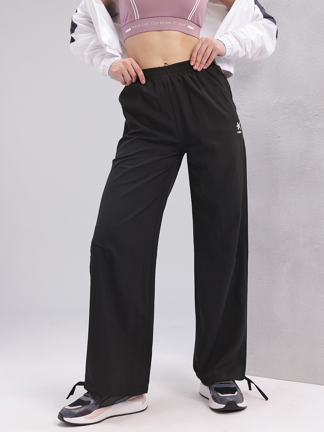 

HRX by Hrithik Roshan Women Flared Lifestyle Track Pants with Toggle Hem, Black