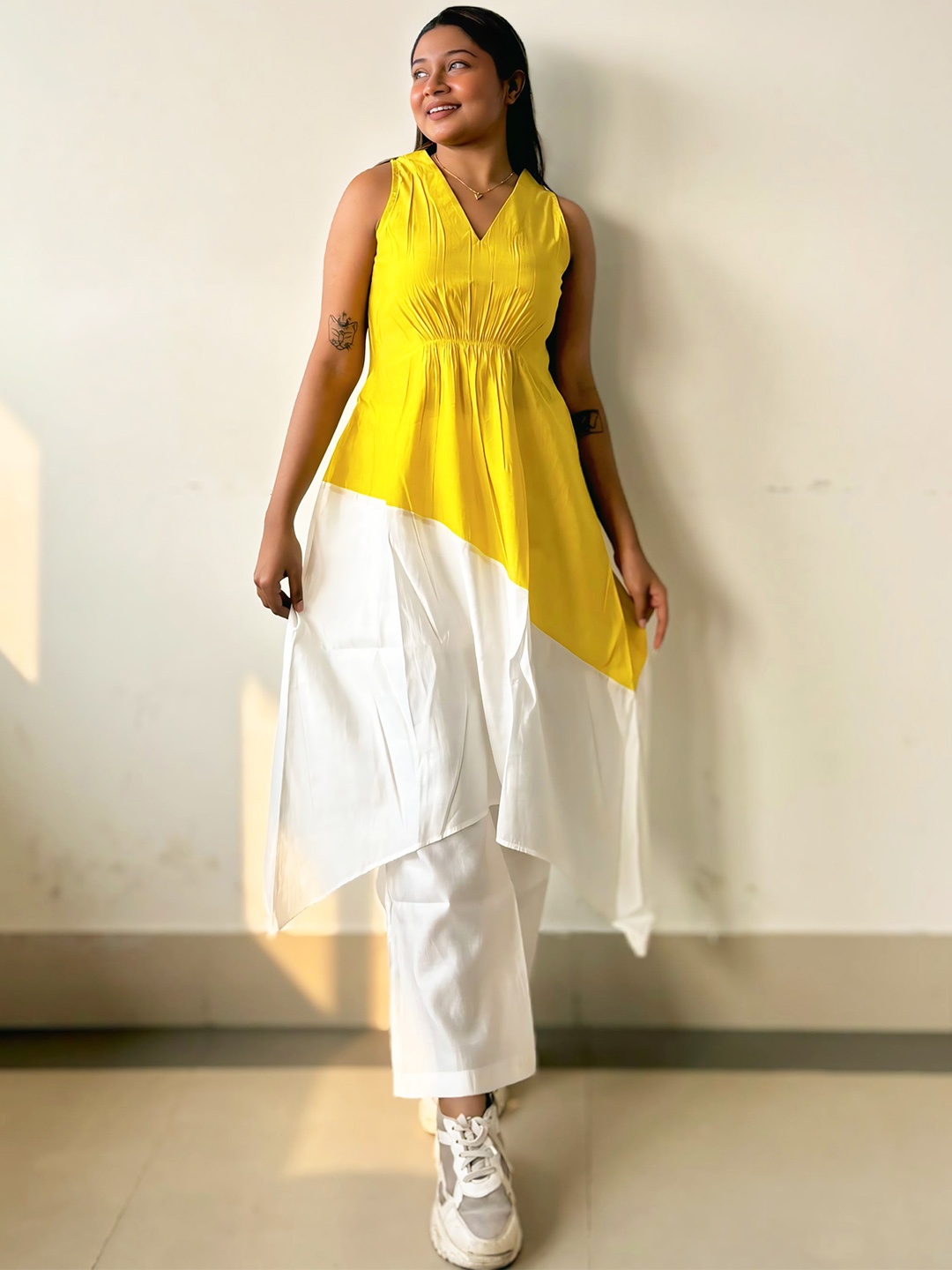 

Moomaya Colourblocked Asymmetric A-Line Kurta with Trousers, Yellow