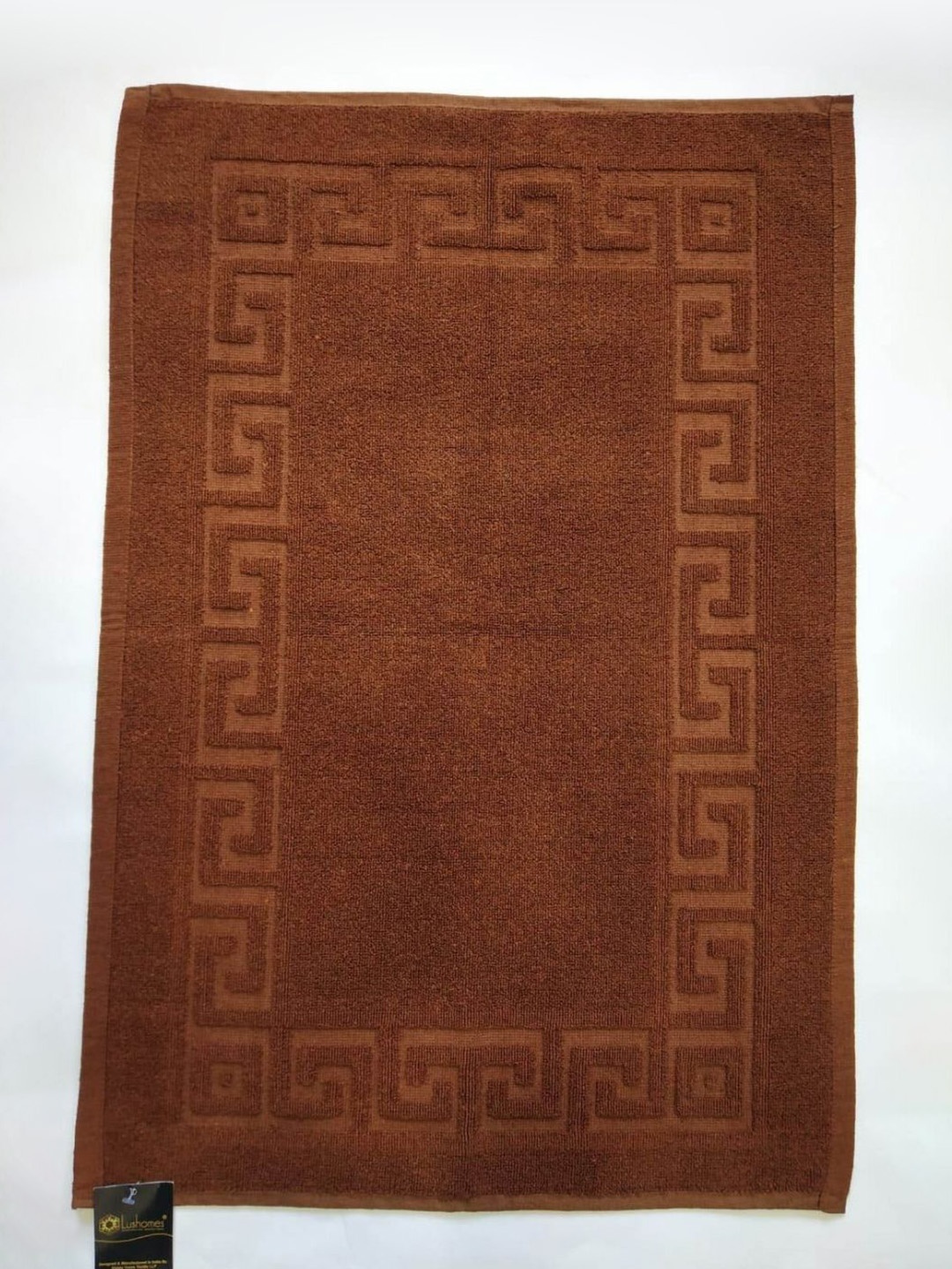 

Lushomes Brown Textured 300 GSM Rectangle Shaped Anti-Skid Cotton Bath Rug