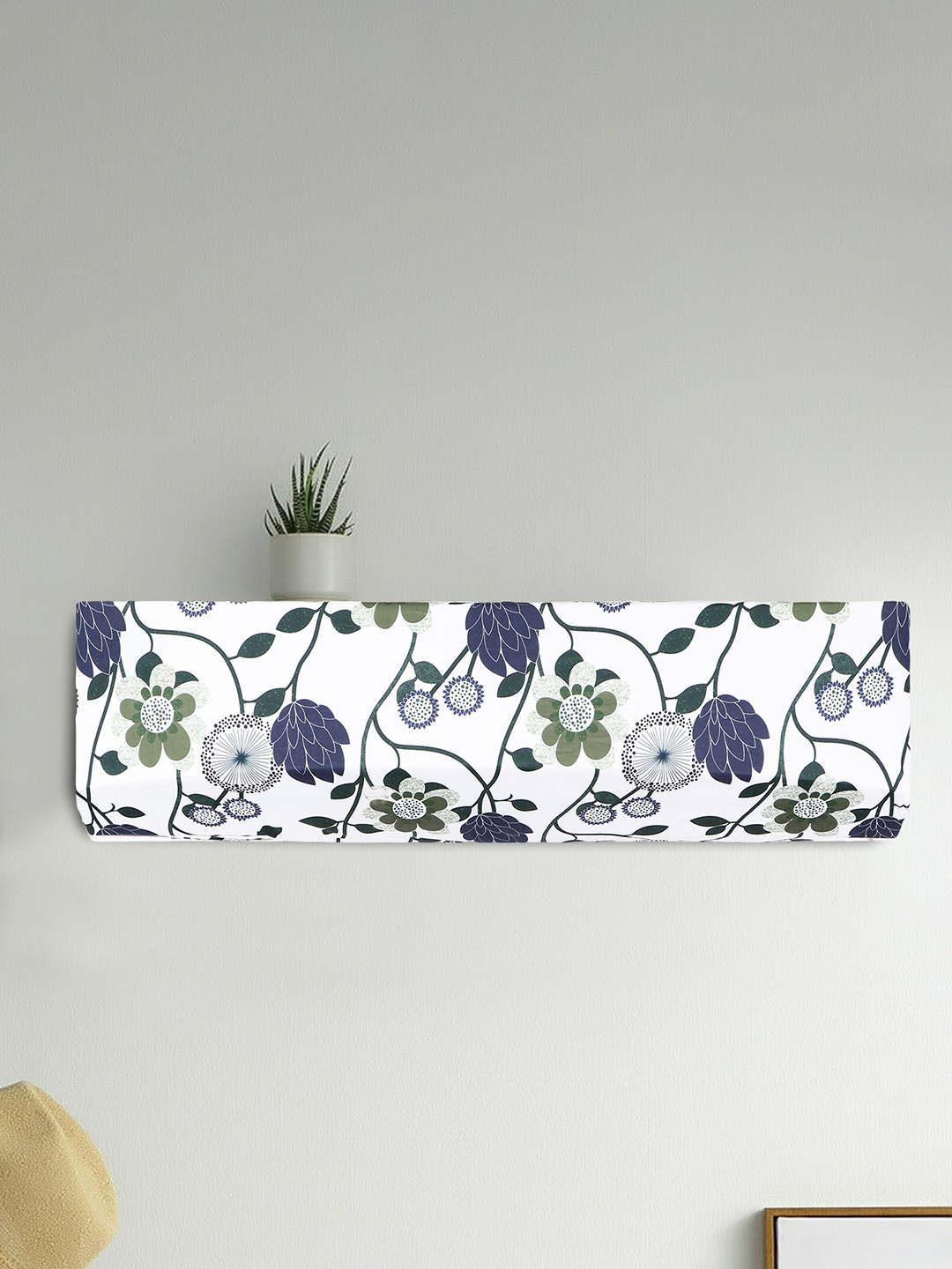

Dakshya Industries White & Blue Printed Air Conditioner Cover