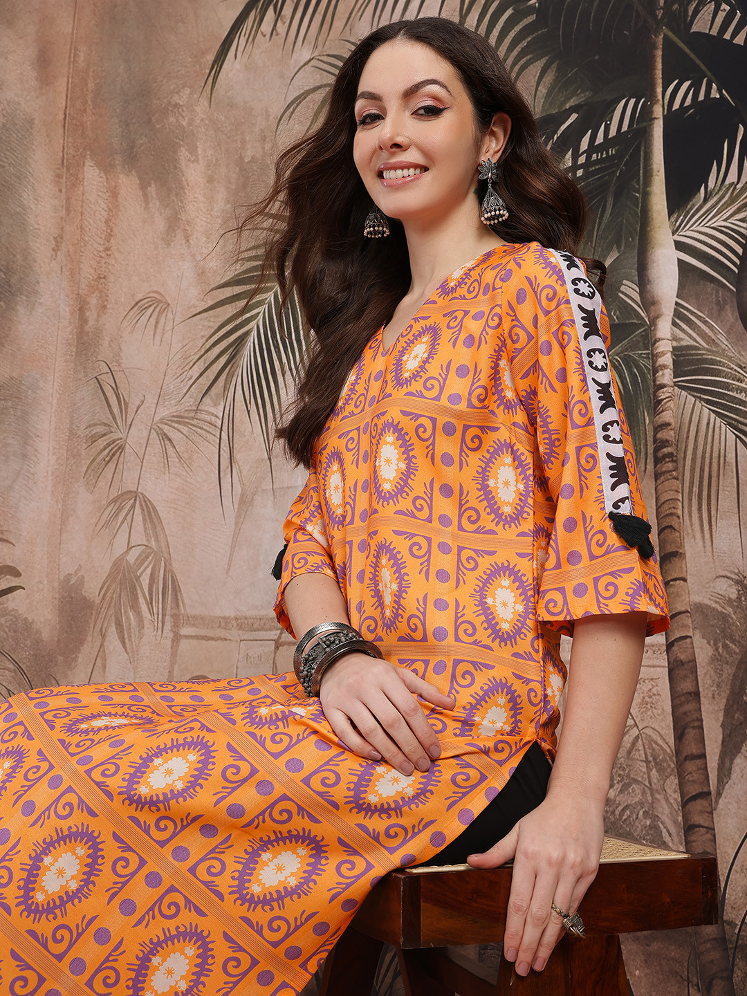 

Sangria Ethnic Motifs Printed Tassel Detail Flared Sleeves Kurta, Orange