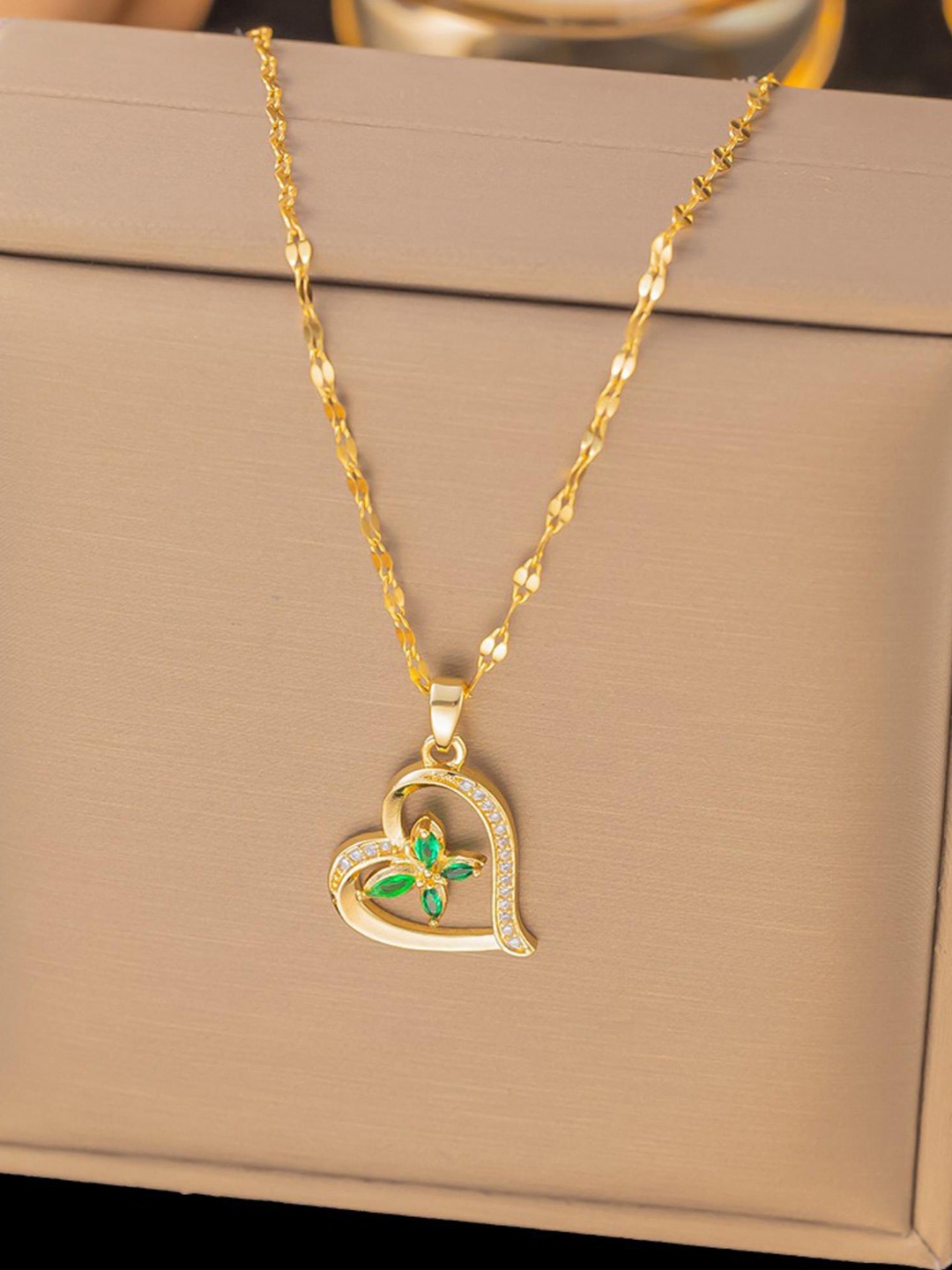 

MYKI Gold-Plated Splashy Stainless Steel Heart Shaped Stone Studded Pendant With Chain