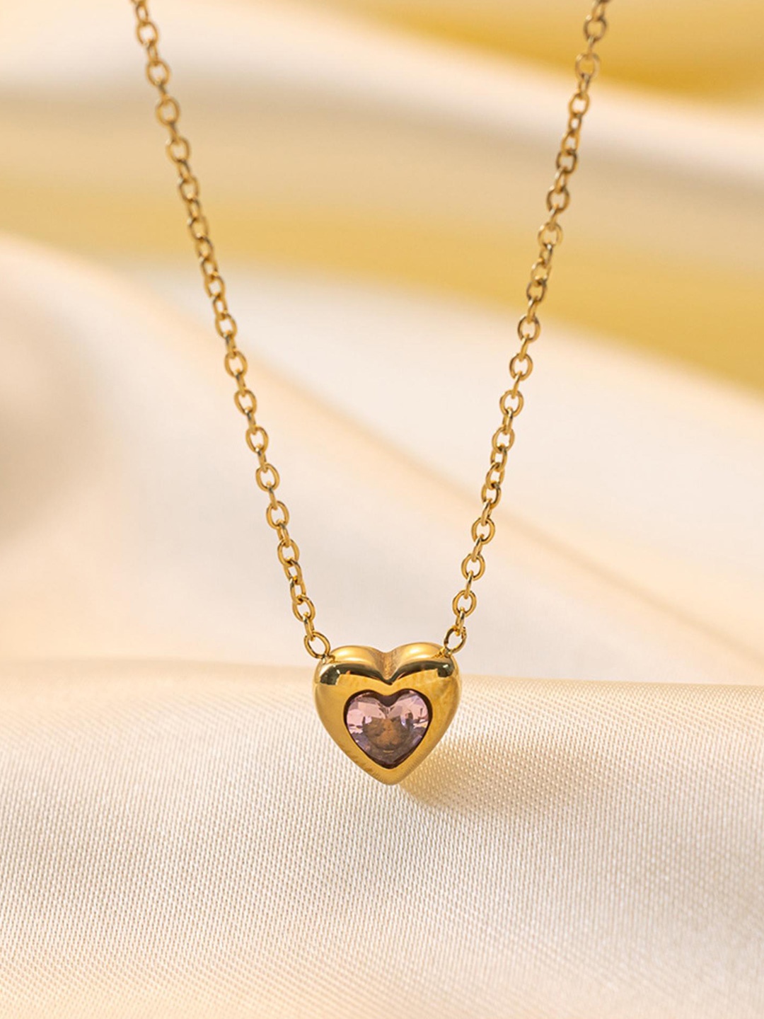 

MYKI Gold-Plated Knockout Stainless Steel Heart Shaped Stone Studded Pendant With Chain