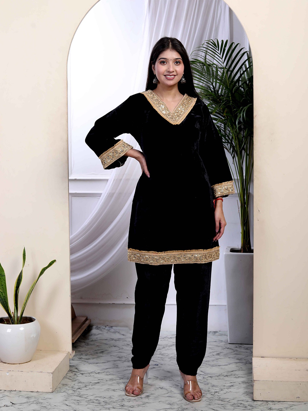 

MIRAVAN Women Embroidered Regular Beads and Stones Velvet Kurti with Palazzos, Black