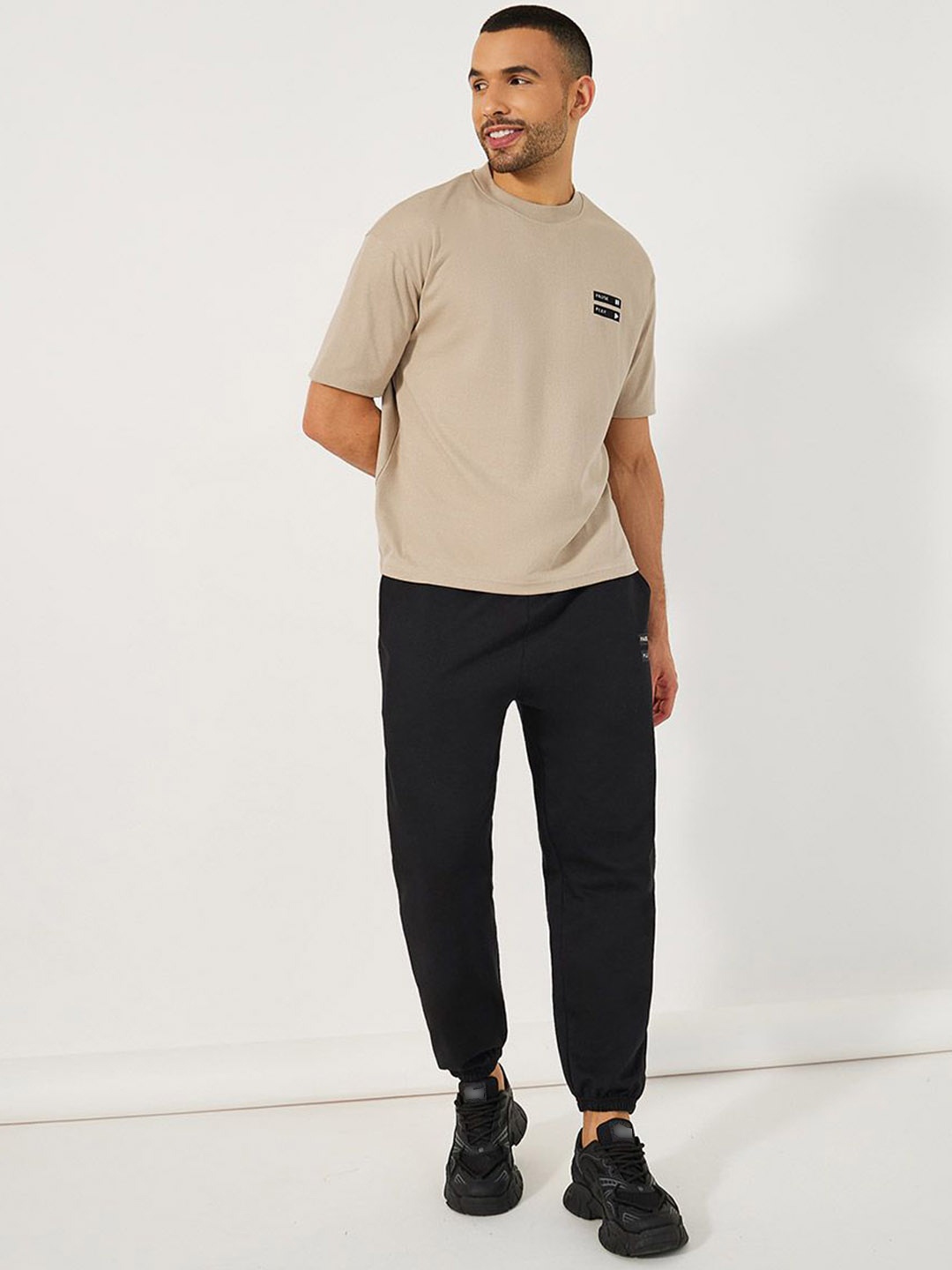 

Styli Minimal Graphic Mock Neck Oversized T-Shirt With Joggers, Beige